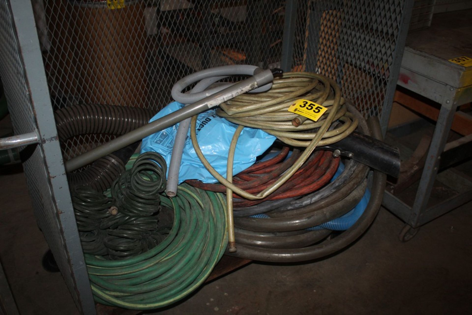 LARGE QTY OF HOSE IN RACK