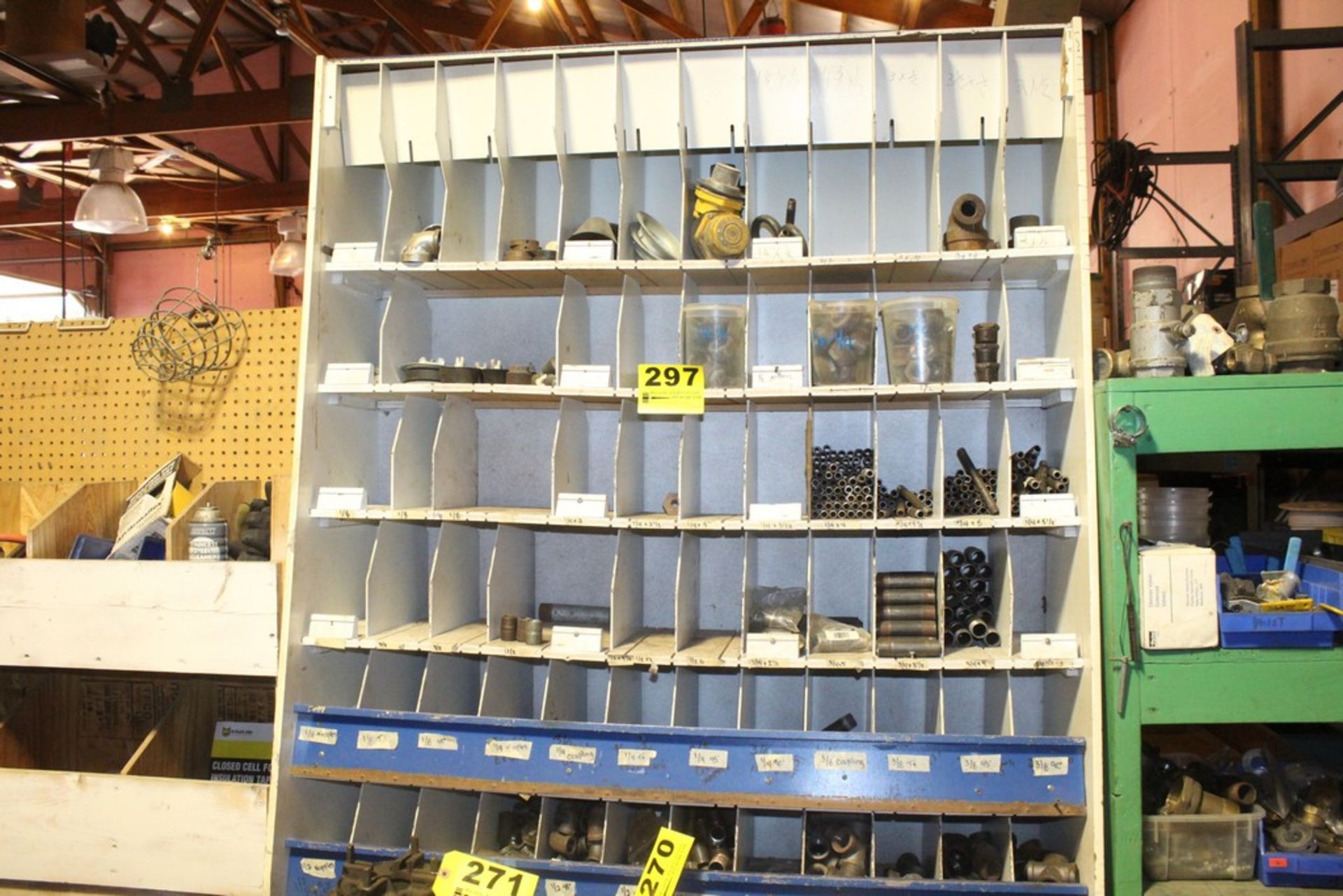 LARGE QTY OF PIPE FITTINGS WITH STORAGE RACK