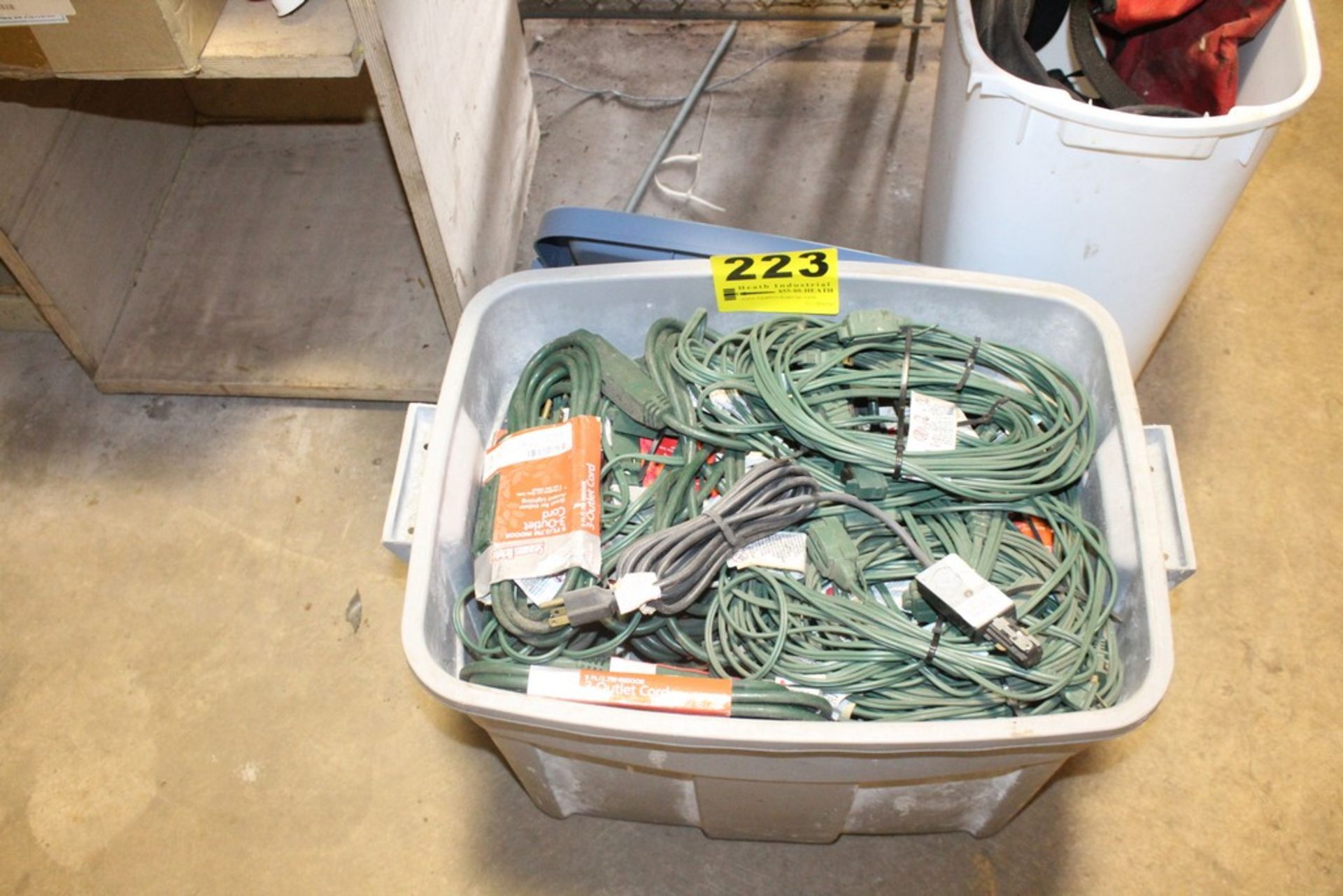 LARGE QTY OF EXTENSION CORDS IN BIN, WITH BIN