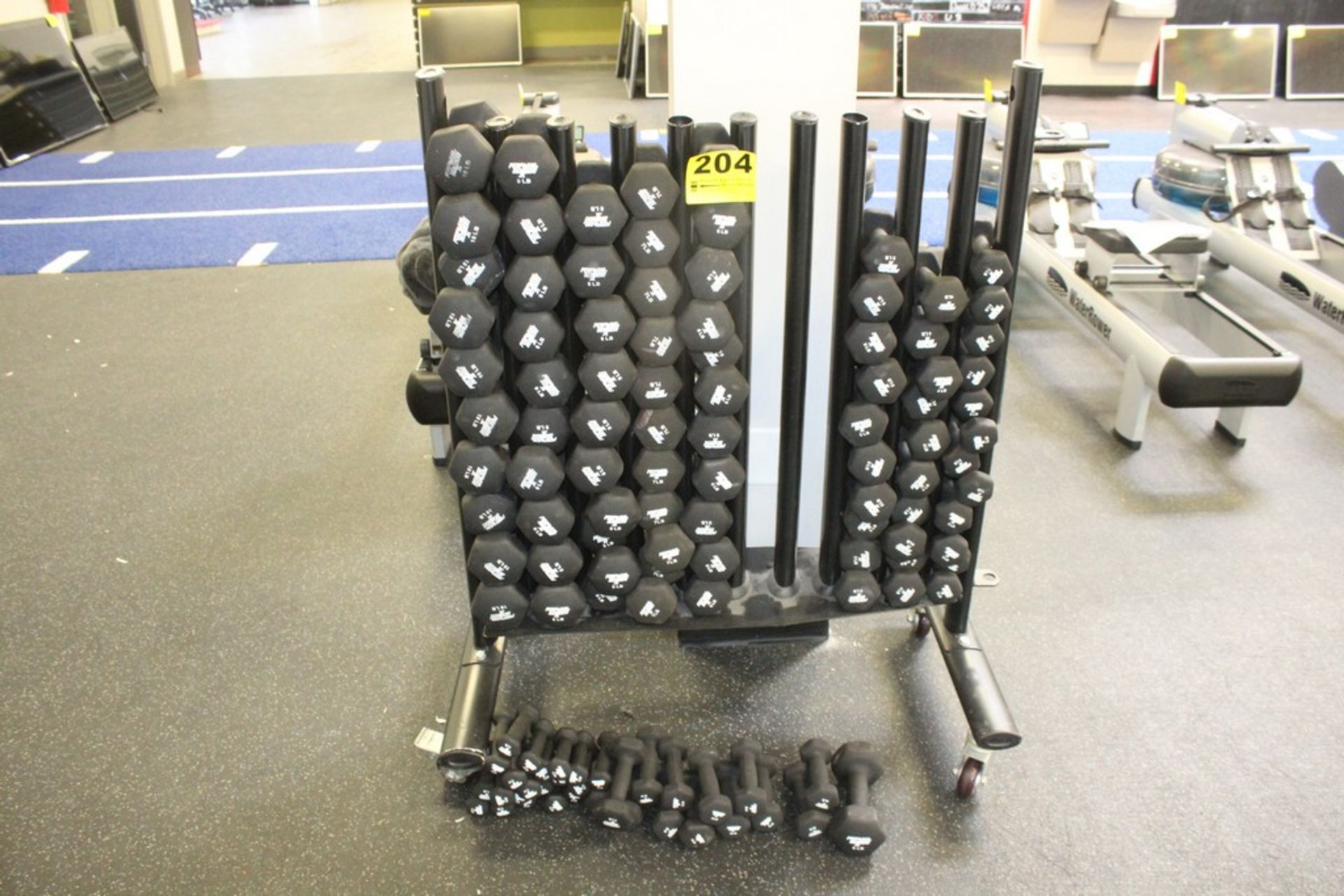 PERFORM BETTER PORTABLE RACK WITH OVER 100 RUBBER DUMBBELLS