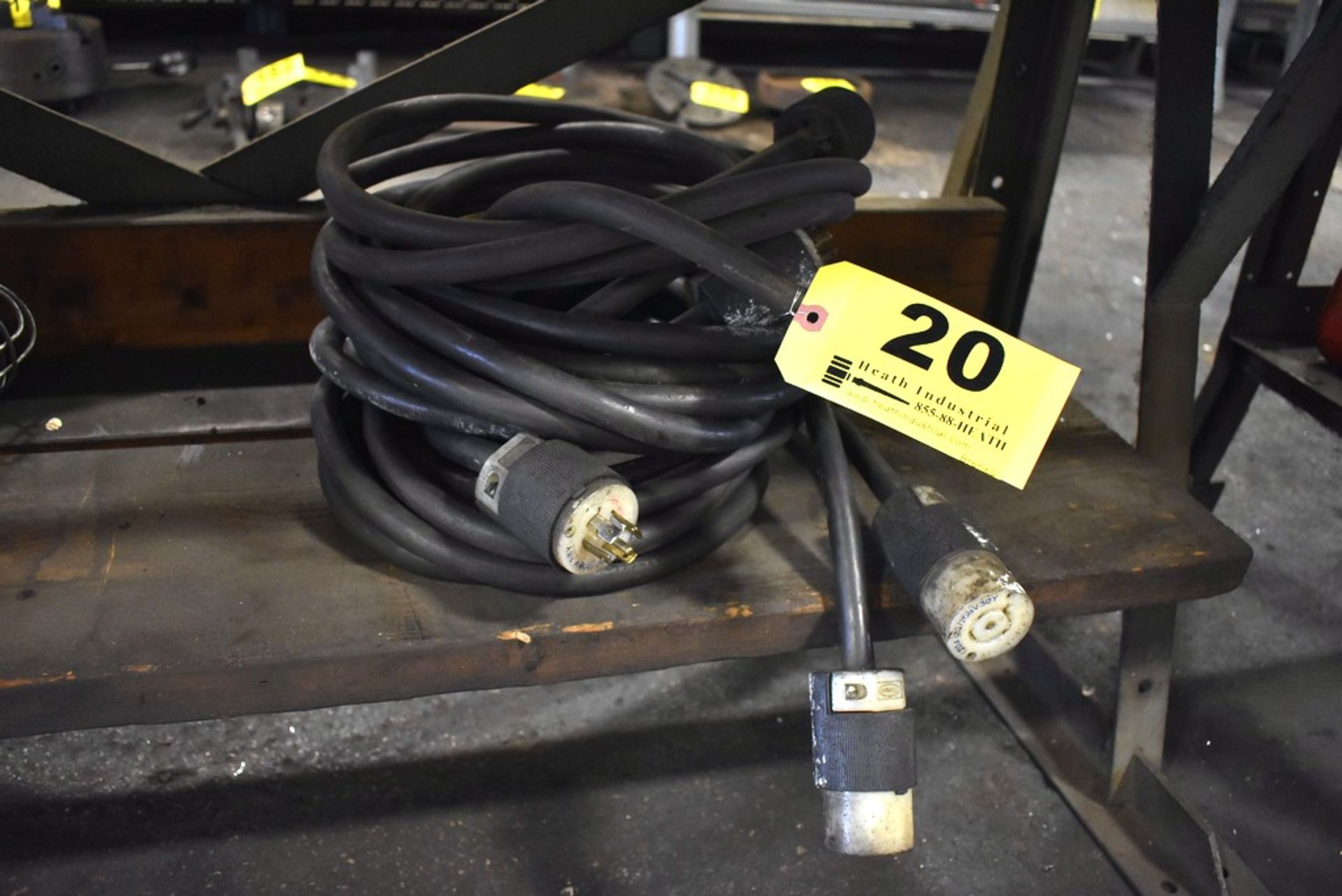 HIGH VOLTAGE EXTENSION CORDS UNDER BENCH