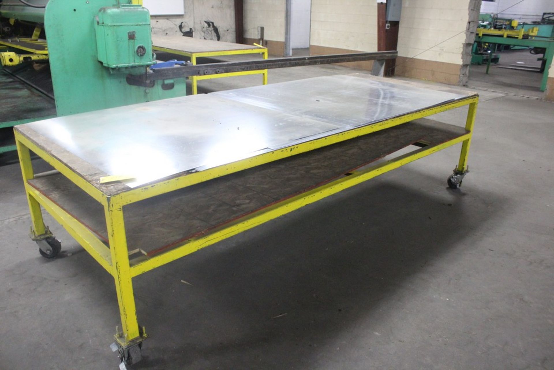 48" x 120" x 33" H Heavy Duty Work Table Mounted on Heavy Duty Casters