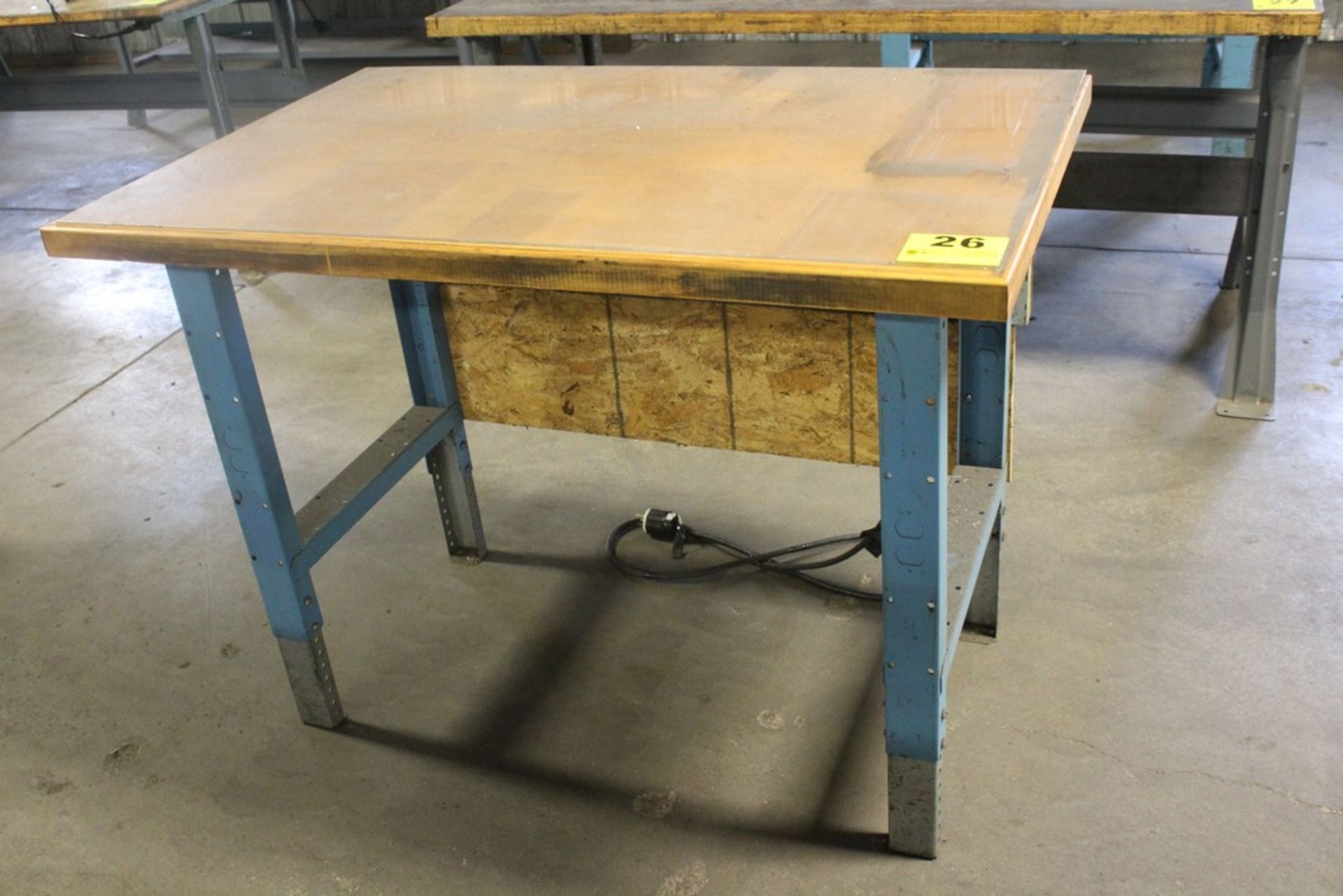 STEEL SHOP TABLE WITH WOOD TOP, 36" X 49" X 30-1/2", WITH ADJUSTABLE LEGS AND POWER OUTLET