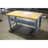 STEEL SHOP TABLE WITH WOOD TOP, 33" X 60" X 29", WITH ADJUSTABLE LEGS AND POWER OUTLET
