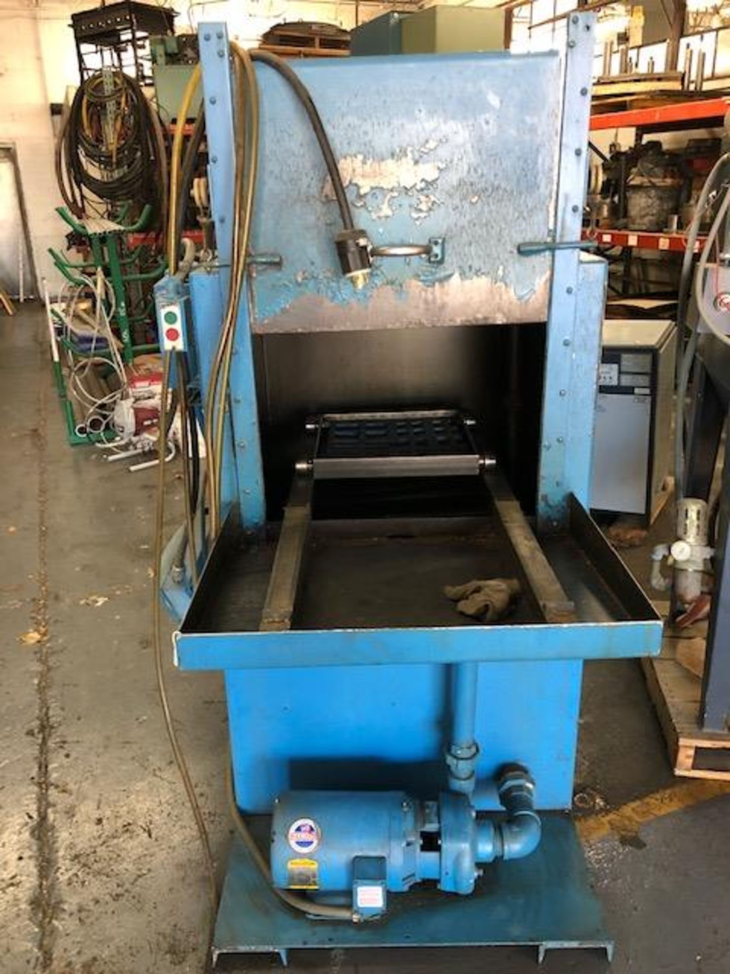 AMI PARTS WASHER: WITH 15” SQUARE SHUTTLE TABLE LOADING FEE: $50.00