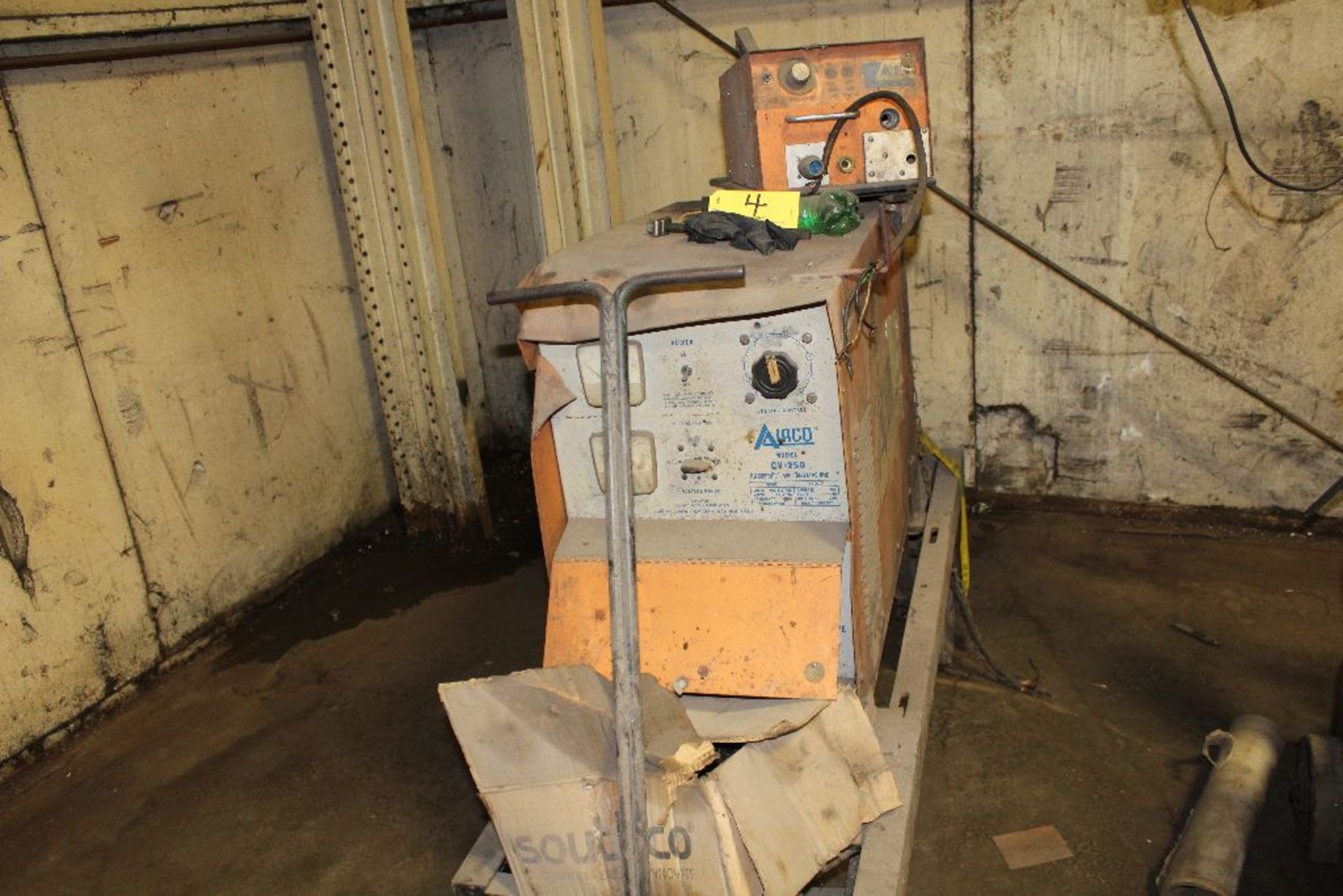 Airco welder CV-250, sn 1346707, w/wire feed, on steel cart.