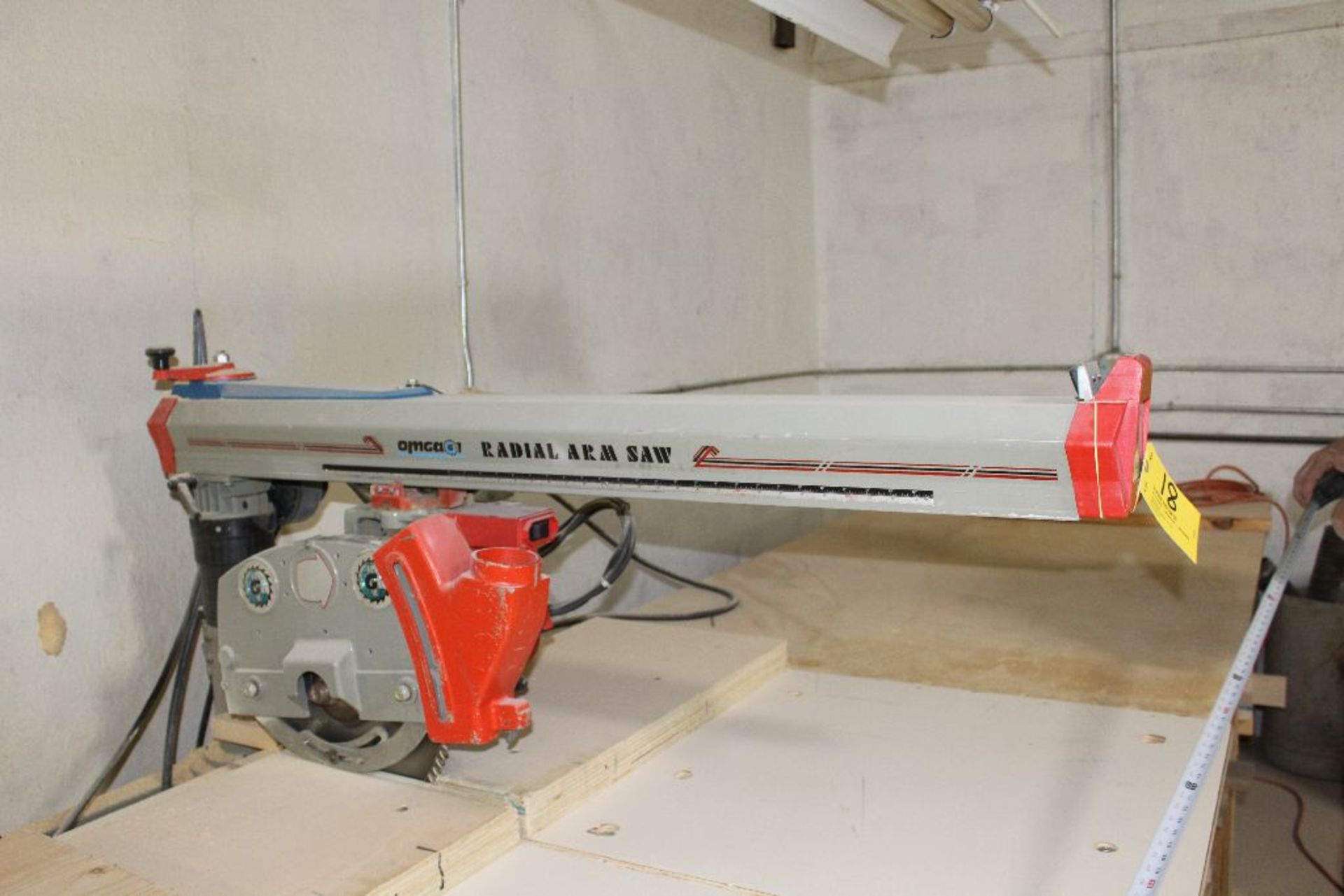 OMGAGA radial arm saw, model RN900, sn 20306, 5 hp., w/47" x 179" lay off table, voltage 230/460.