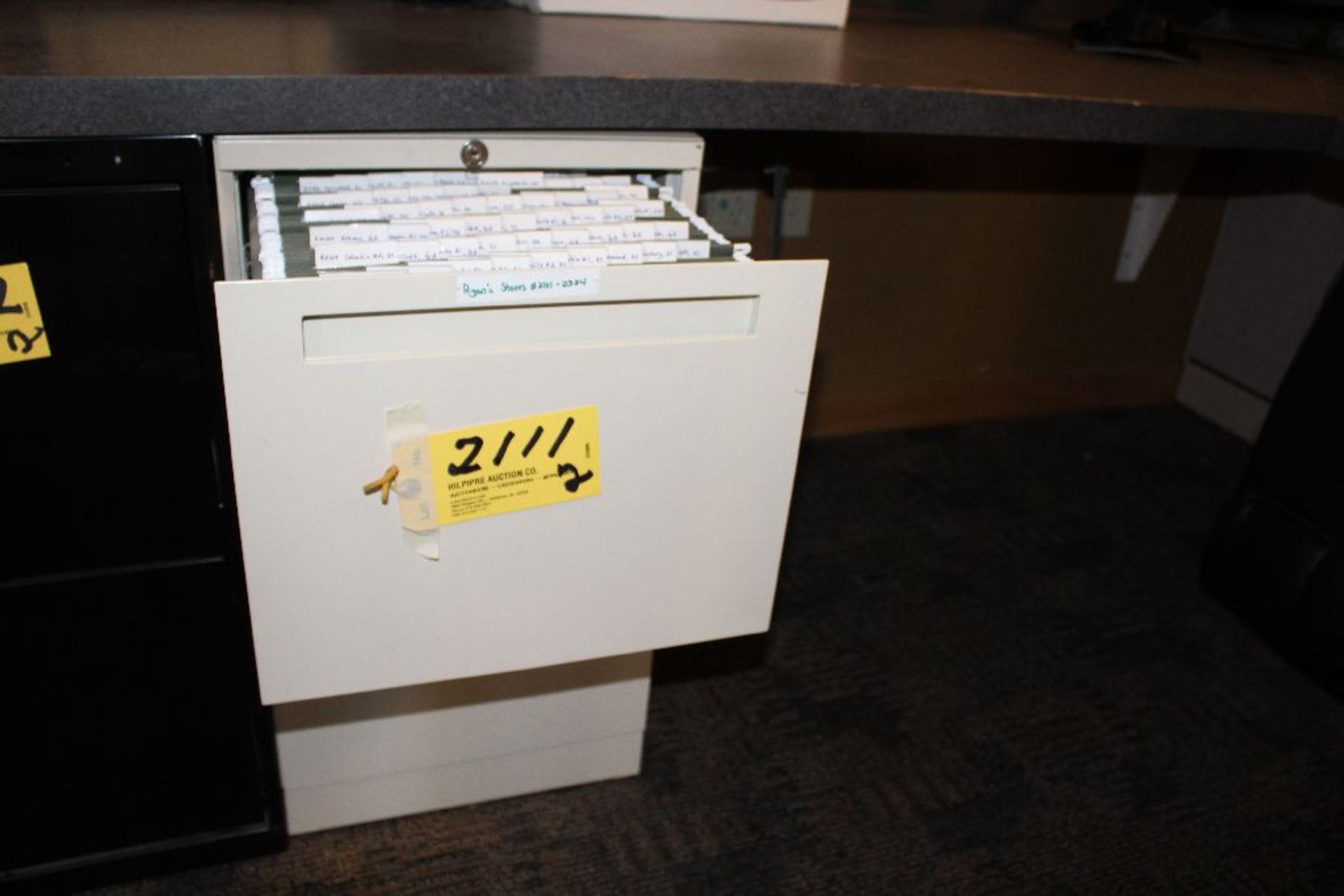 2 drawer file cabinets, cream color.