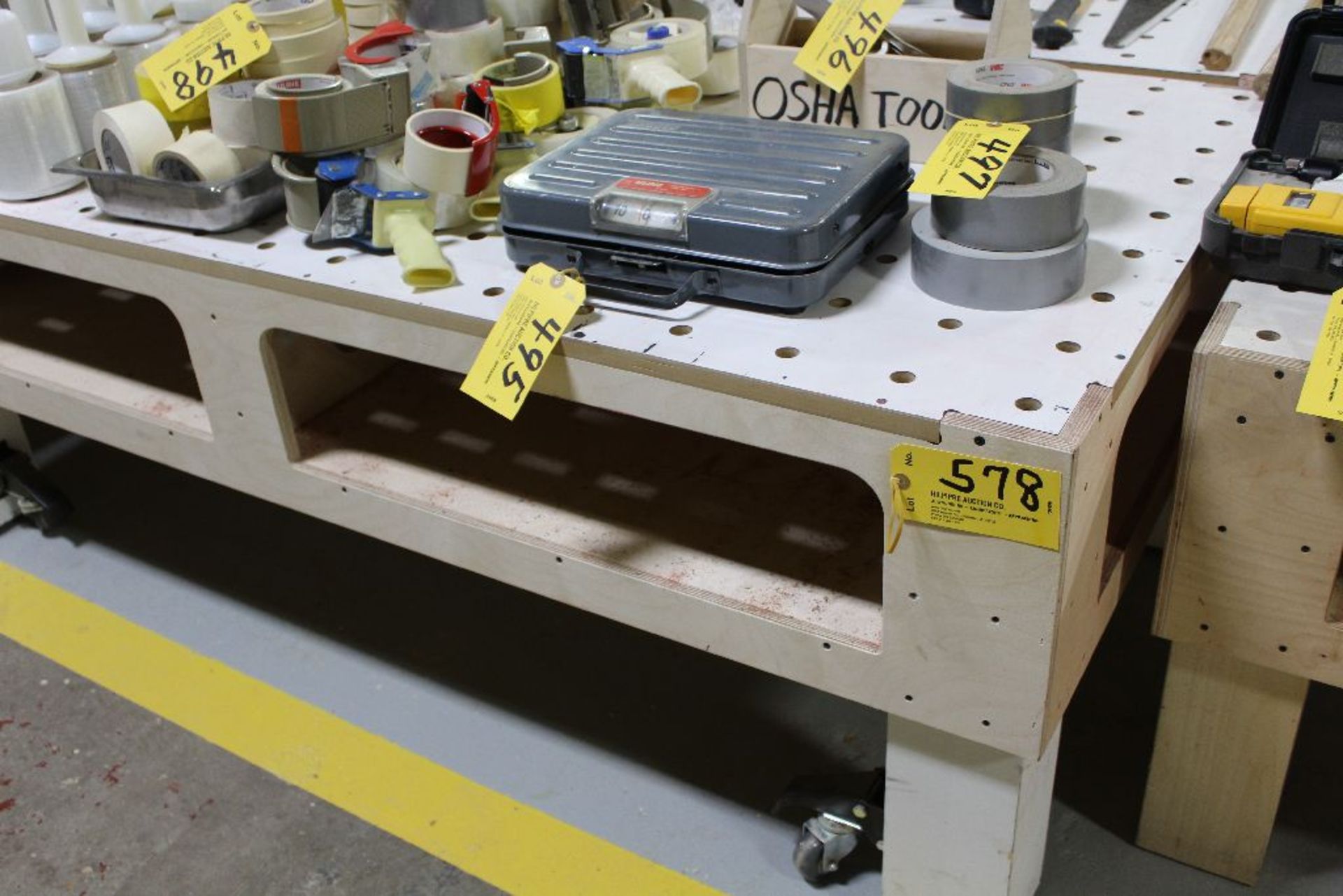 Rolling work bench, 3 x 6, perforated, 2 ft. high.
