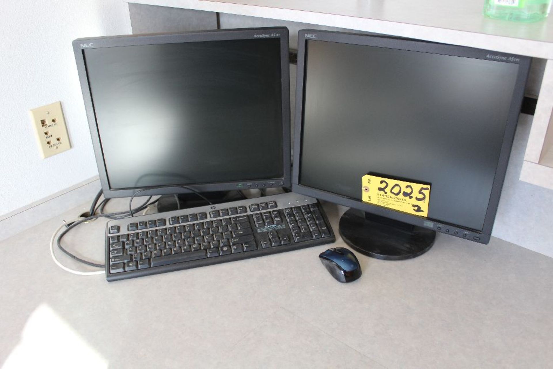 NEC monitors and keyboard.