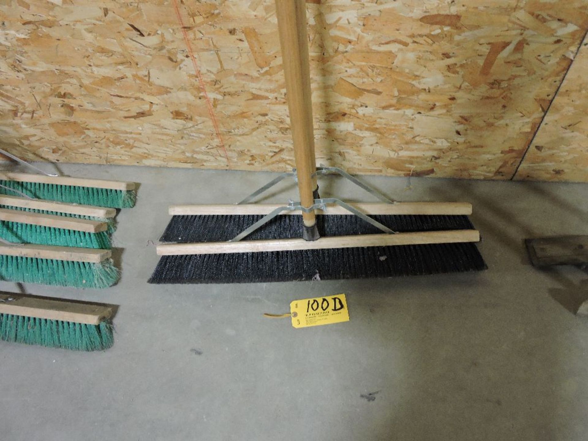 Black brooms.