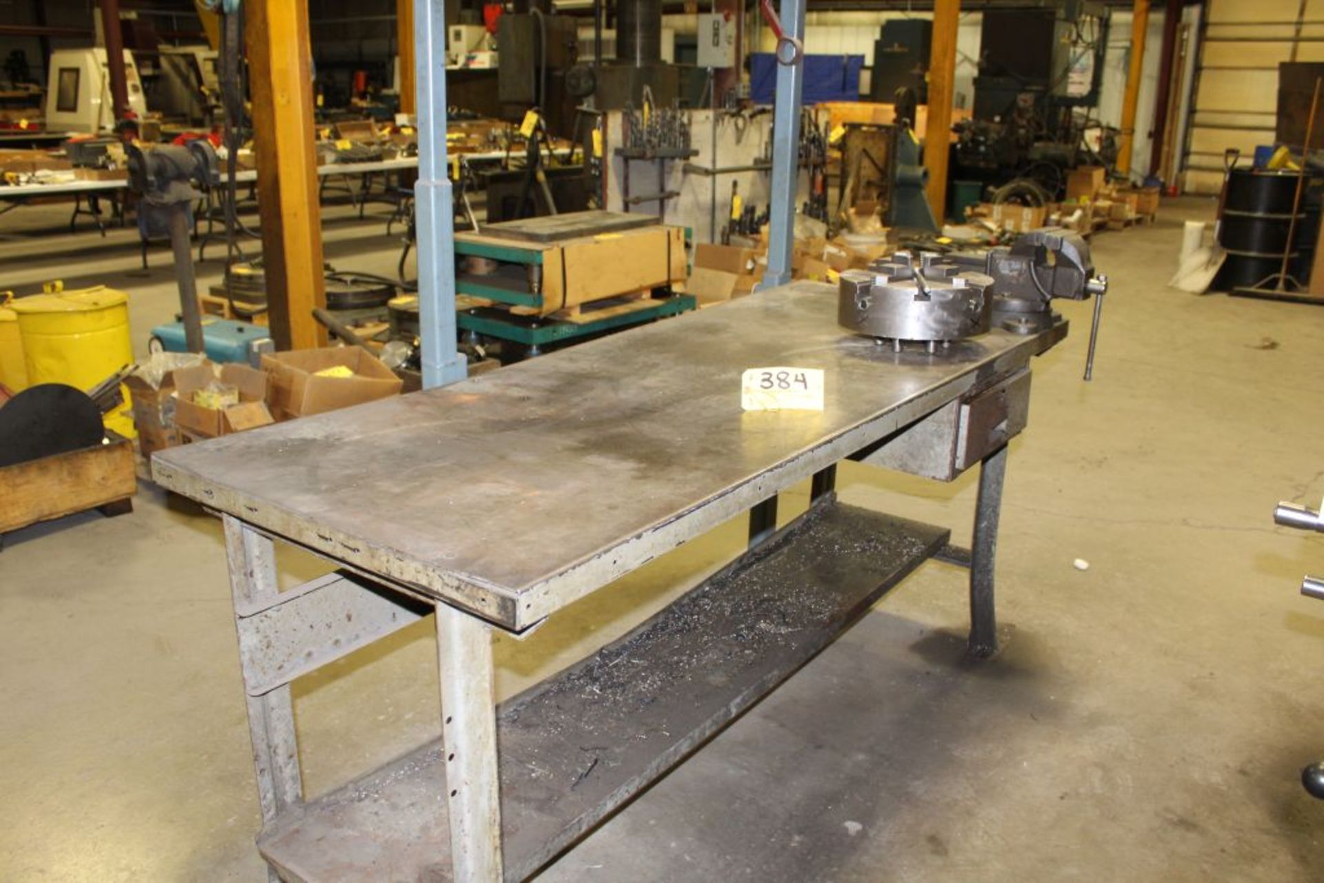 Steel work table with trolley hoist.