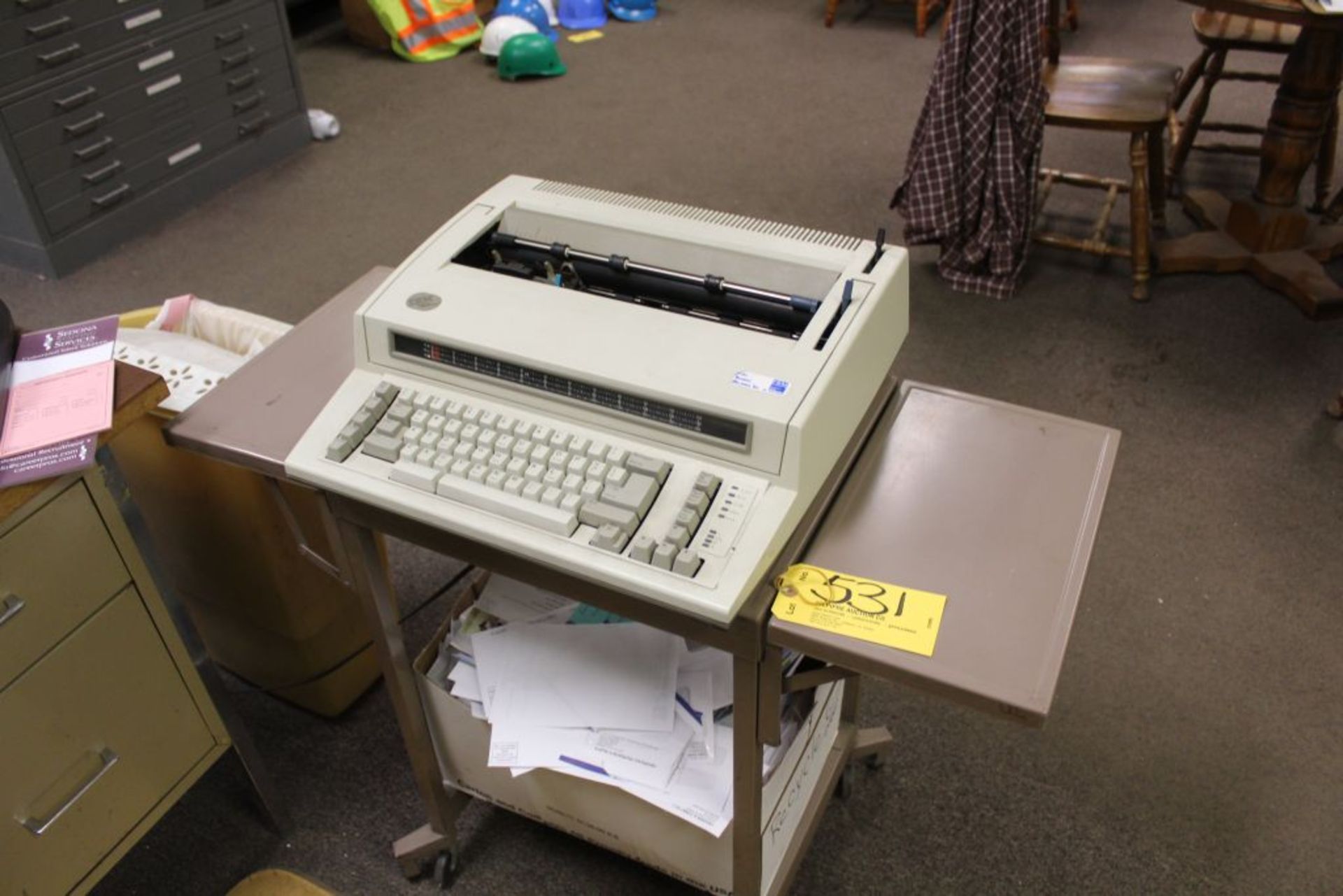 IBM typewriter with cart.