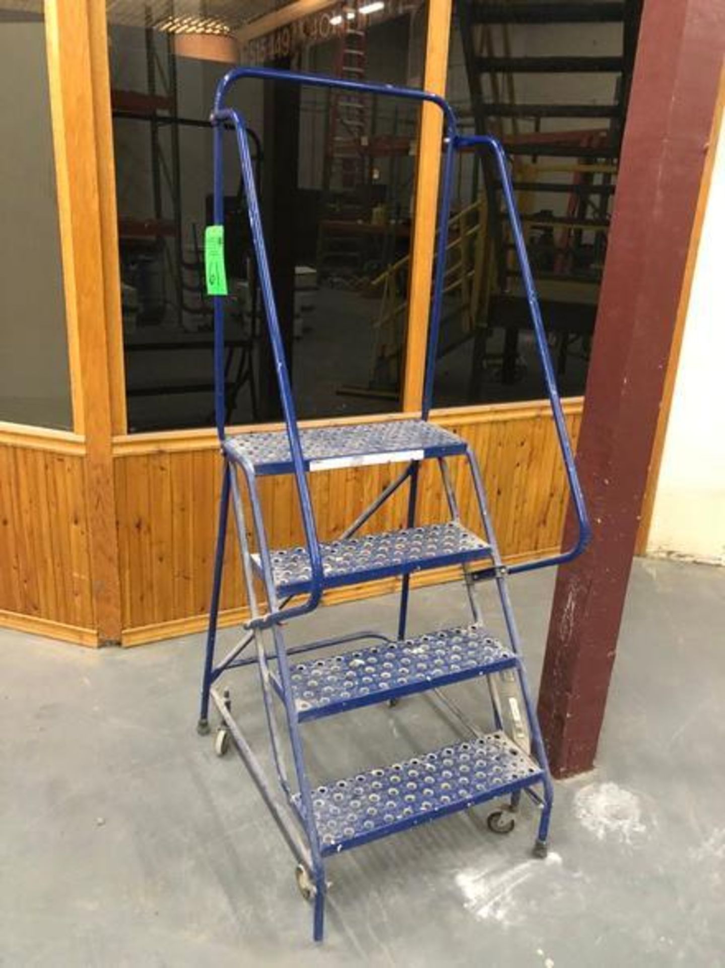 Louisville 4-Step Steel Portable Warehouse Ladder with Handrails and 16" Wide Grip-Strut Tread