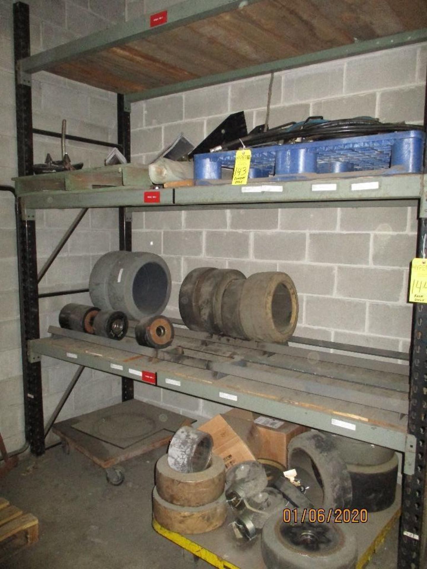 Contents Of Racking Including Hydrulic Hoses, Forklift Wheels, Brake Shoes, Wheel Hubs Etc. FORKS NO