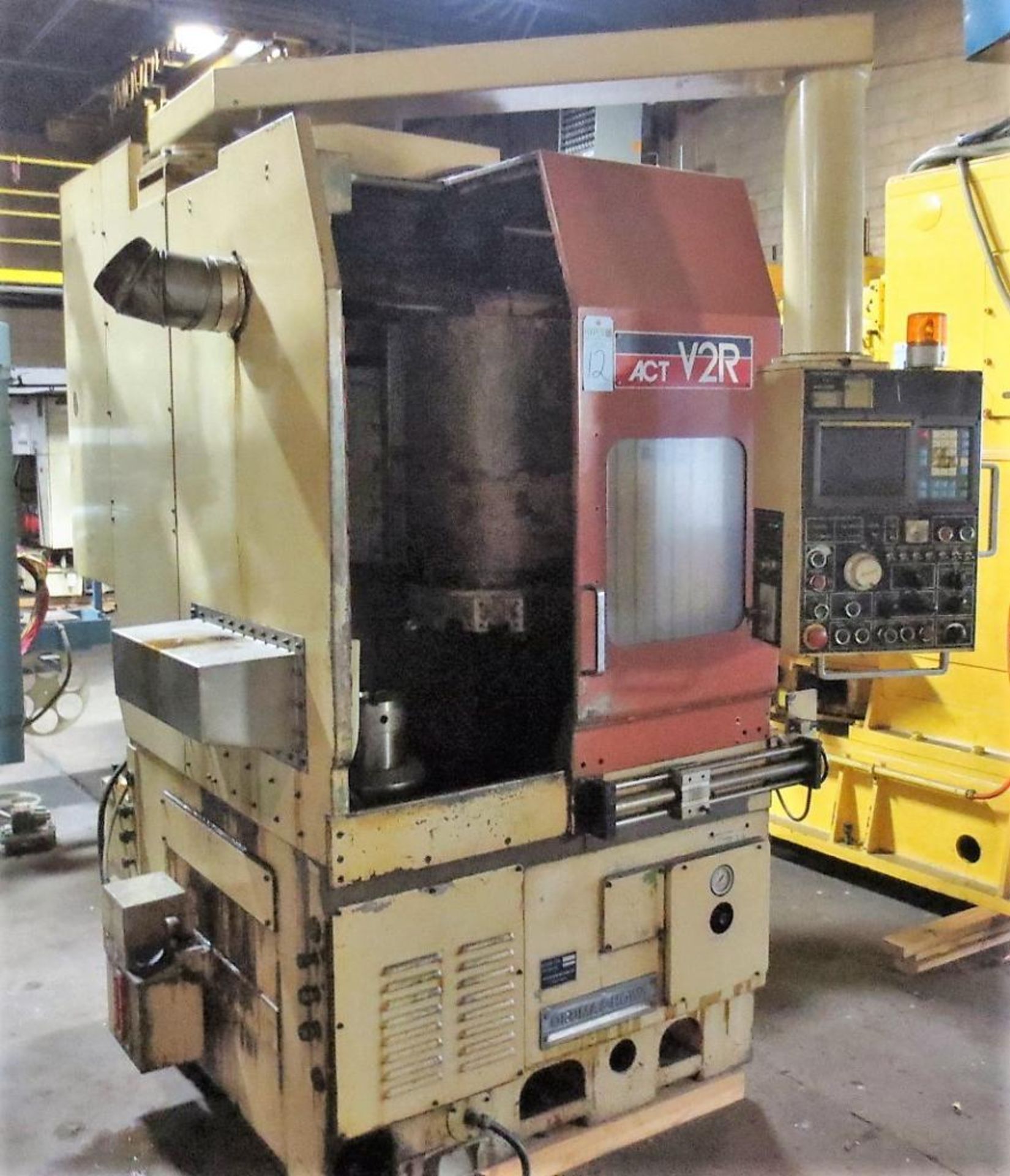 Okuma Model ACT-VR2 Vertical CNC Turning Center S/N: 16011 Fanuc OT CNC Control. Loading Fee is $750