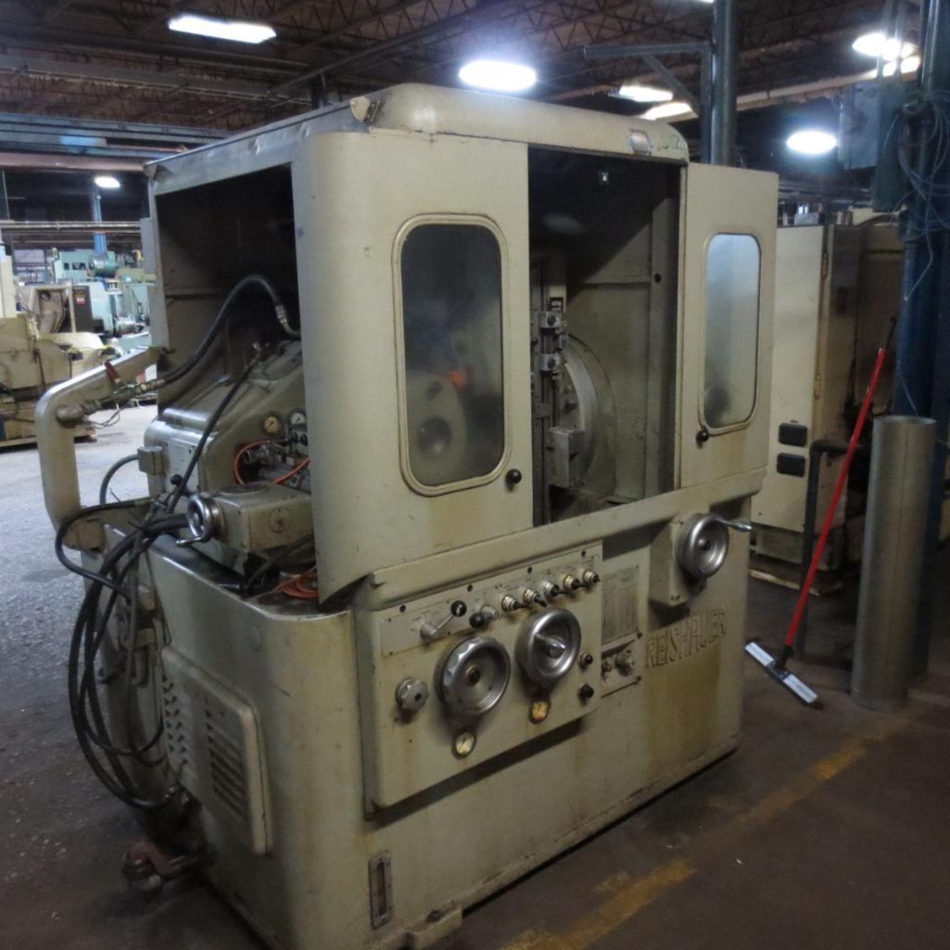 Reishauer Model NZA Grinder. Loading Fee is $350.00