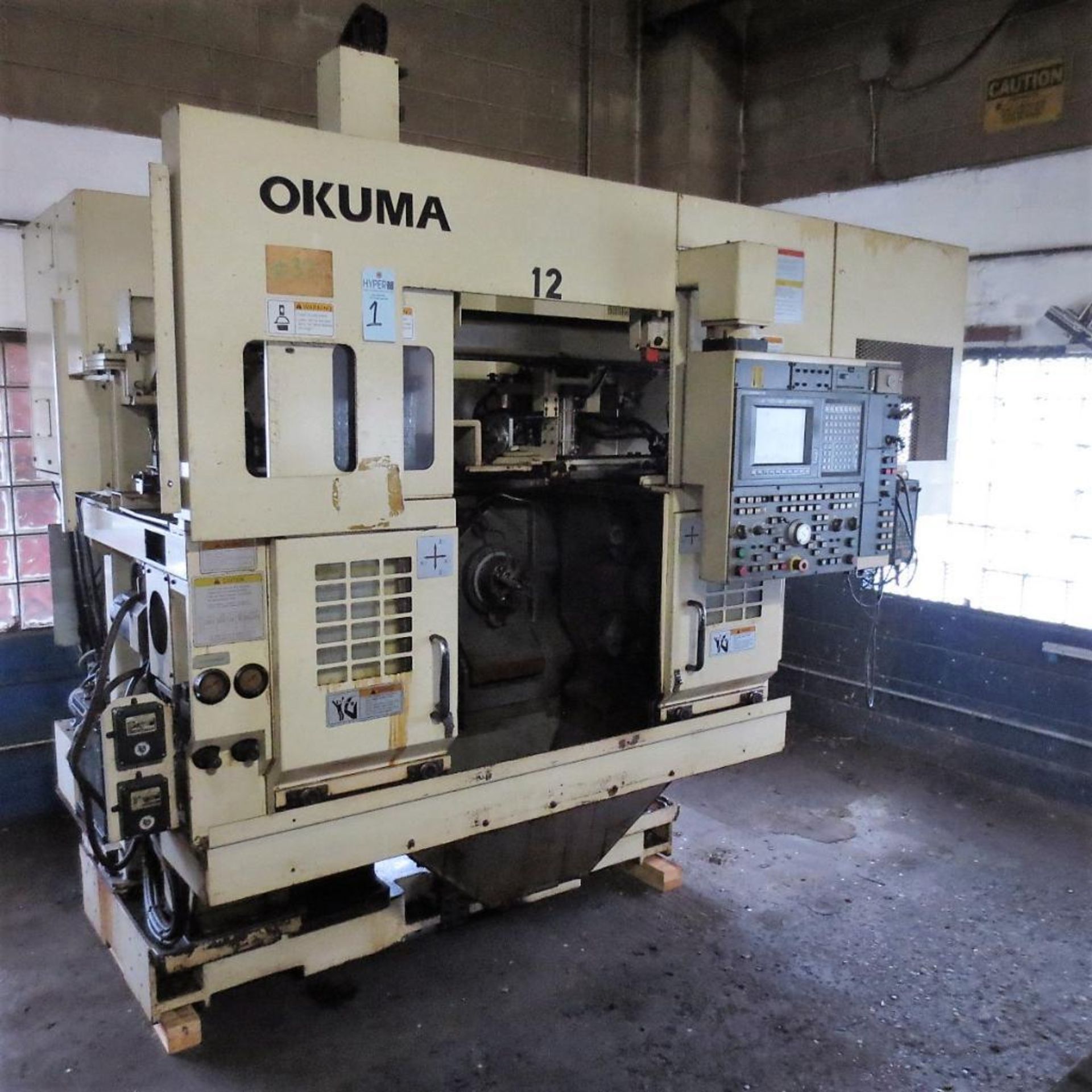 Okuma Model LFS-10 Twin Spindle Vertical CNC Turning Center S/N: 0091, Okuma OSP-7000L CNC Control,