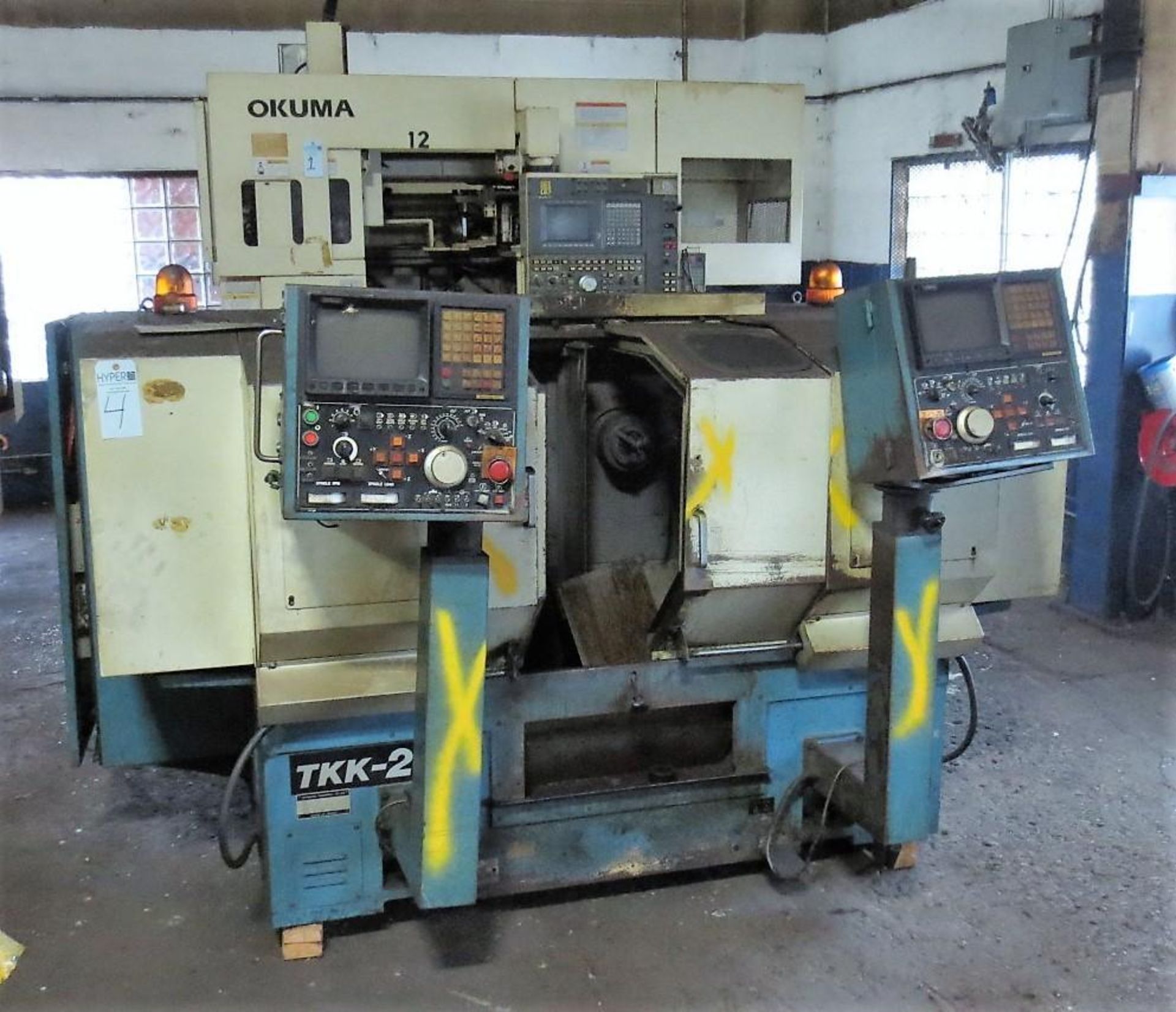 Takamatsu Model TKK-2S Spindle CNC Chucker S/N: 8512-902 Fanuc 10T CNC Control. Loading Fee is $350.