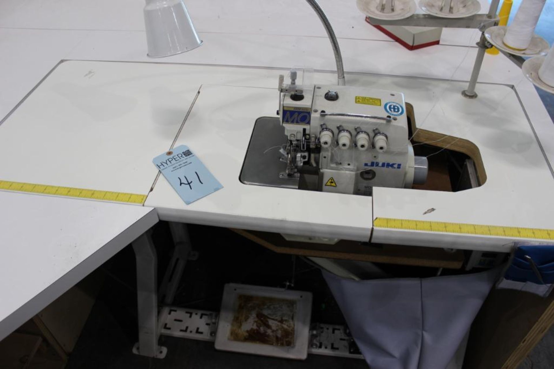 Juki model MO-6814S 4 thread overlock machine class BE6-40H s/n RM0KD01034 w/Sewing Table