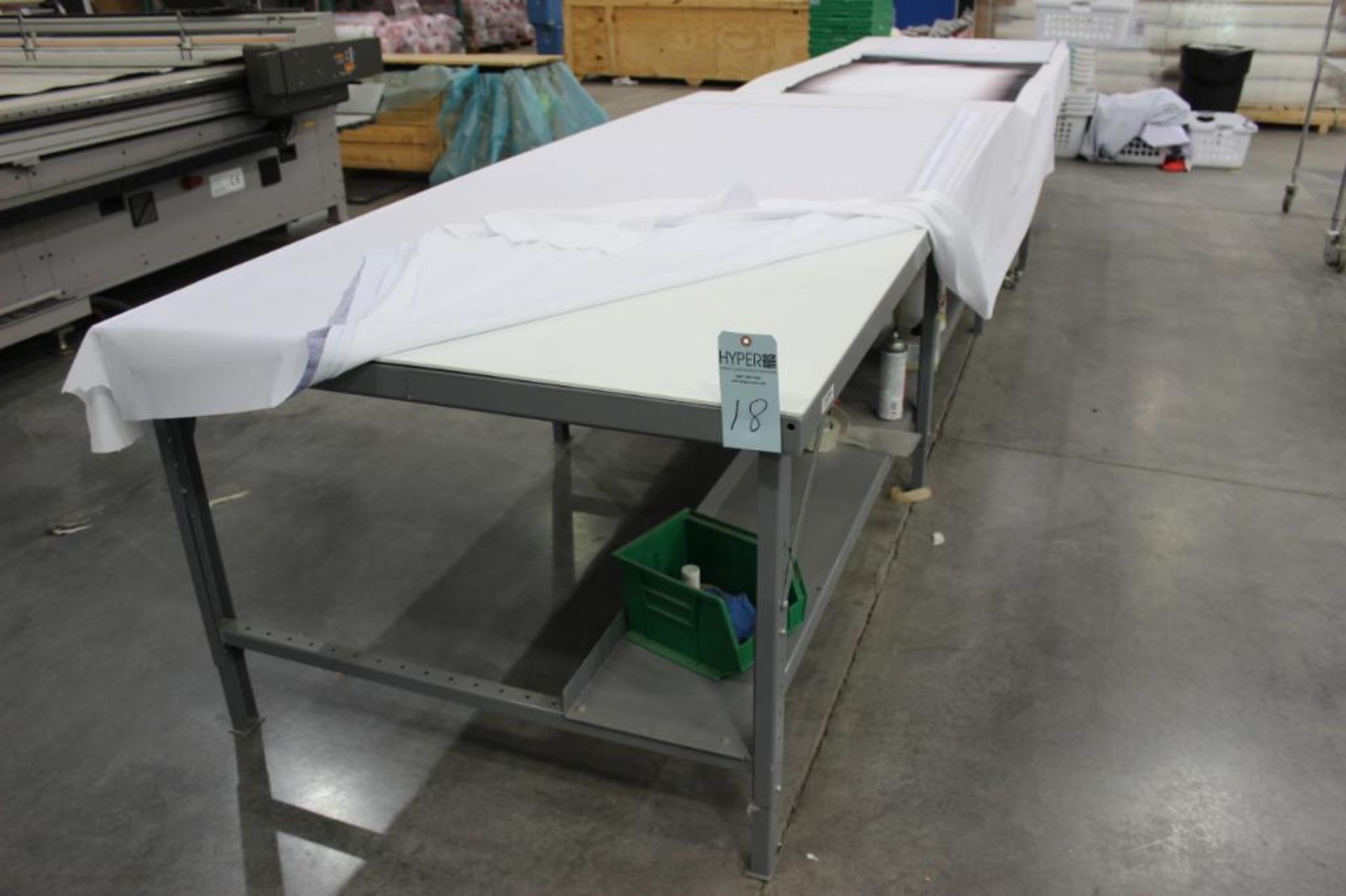 (2) 5' x 10'6” cutting tables (no contents on top)