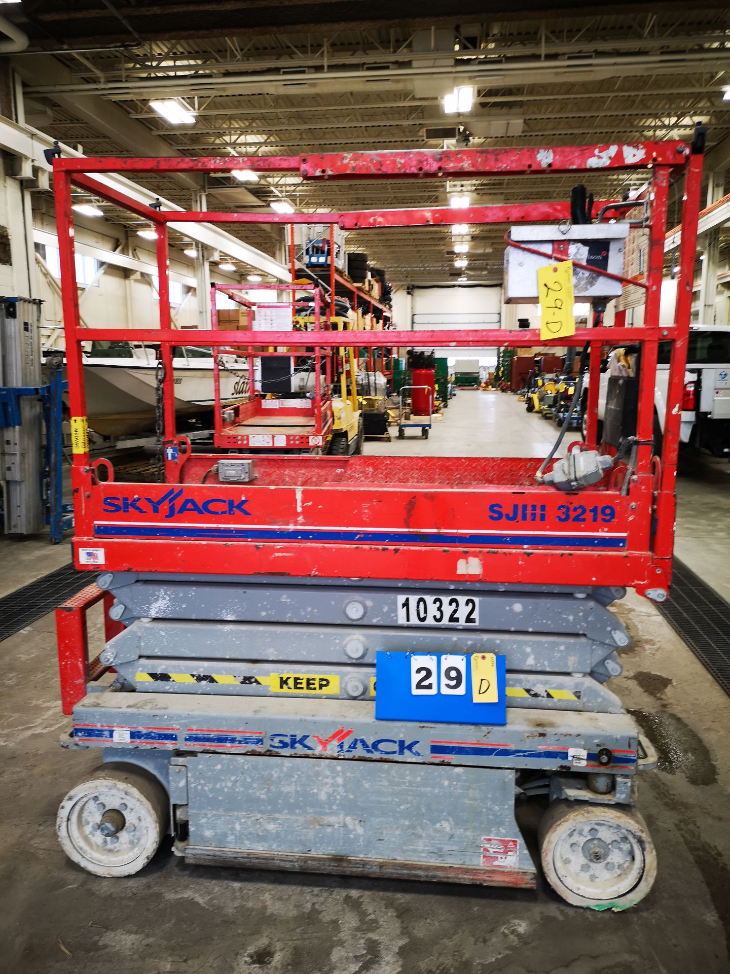 SKYJACK SJIII 3219 ELECTRIC SCISSOR LIFT, 550LB CAP. (2 PERSONS + EQUIPMENT), 24V, 19'H, 29"W X 68"