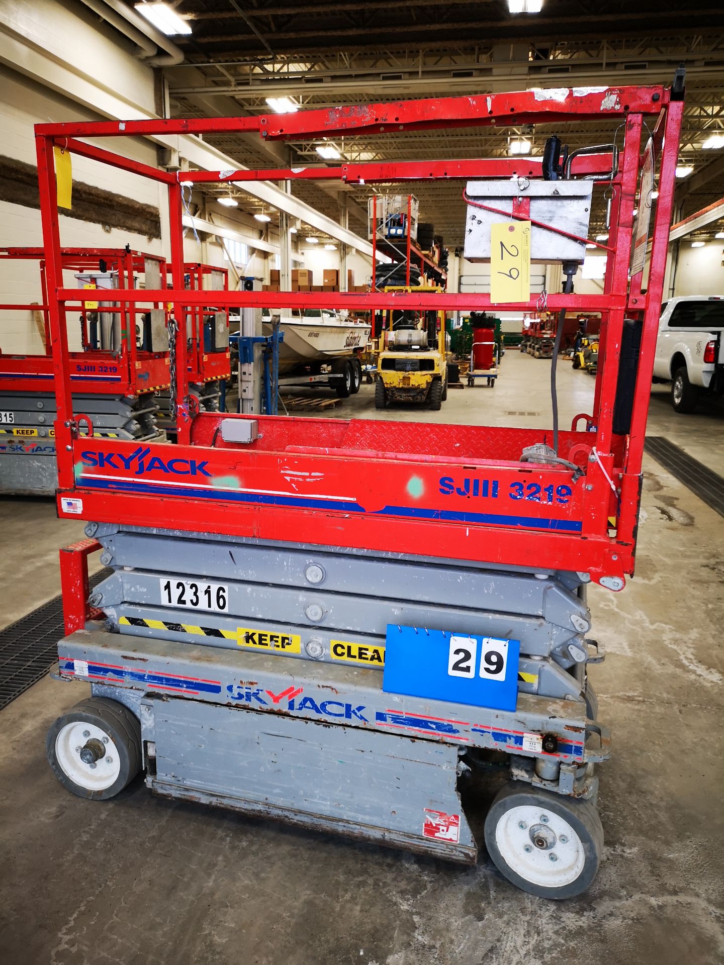 SKYJACK SJIII 3219 ELECTRIC SCISSOR LIFT, 550LB CAP. (2 PERSONS