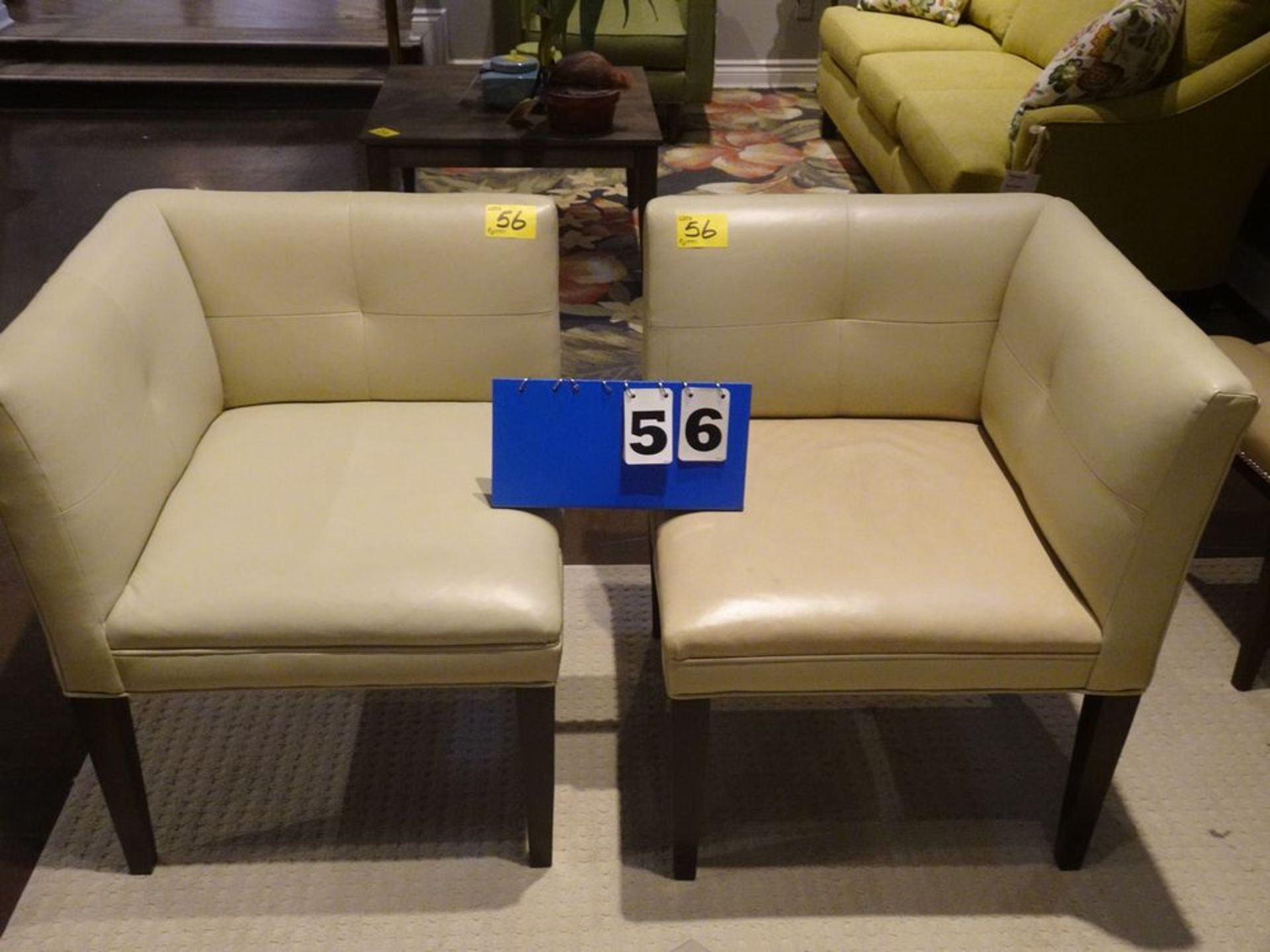 PAIR OF BEIGE LEATHER CORNER CHAIRS (SLIGHT COLOR CHANGE IN CUSHIONS)