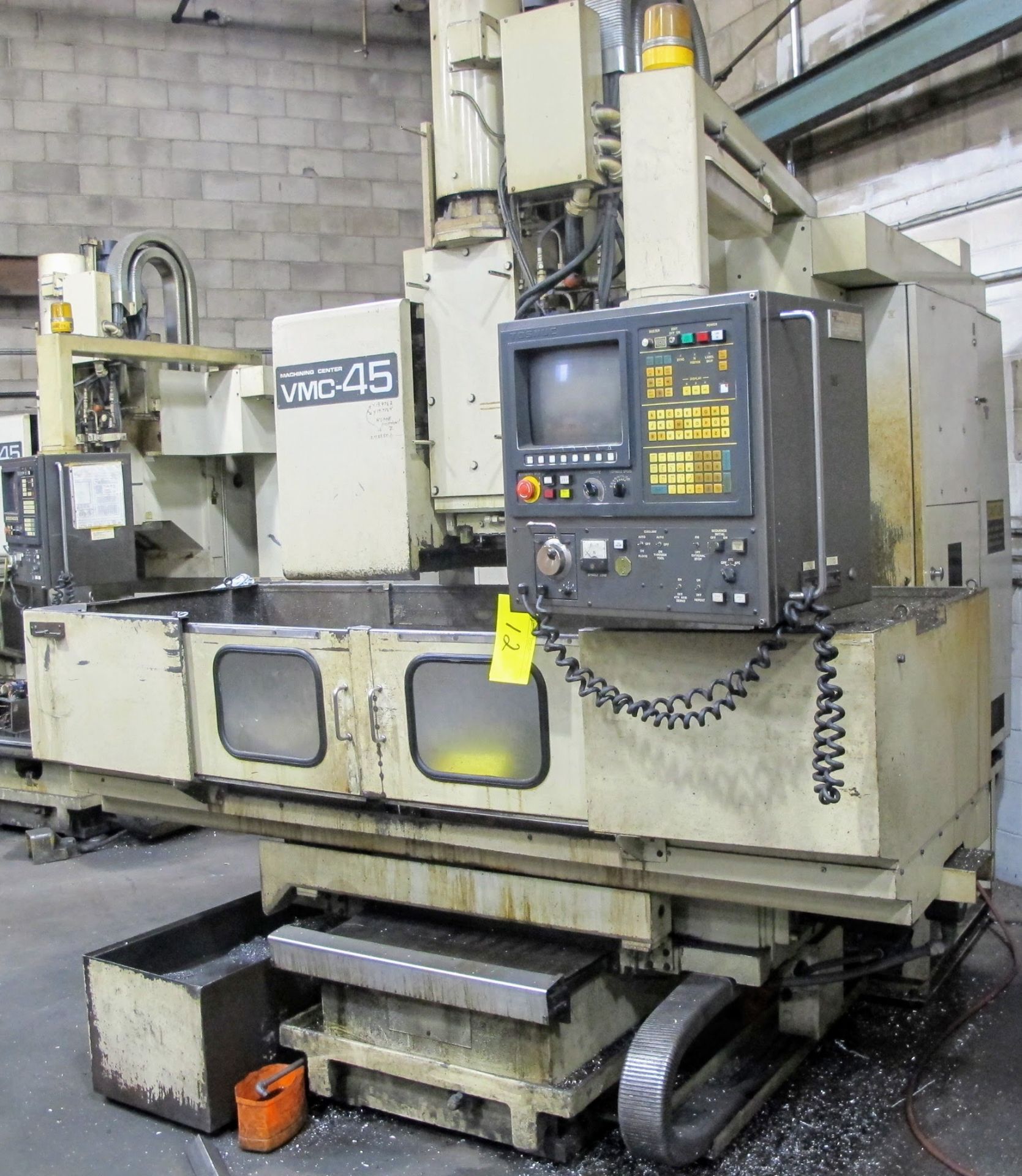 SHIBAURA VMC-45 CNC VERTICAL MACHINING CENTER, 18" X 40" TABLE, TOSNUC CNC CONTROLS, 20 ATC, COOLING