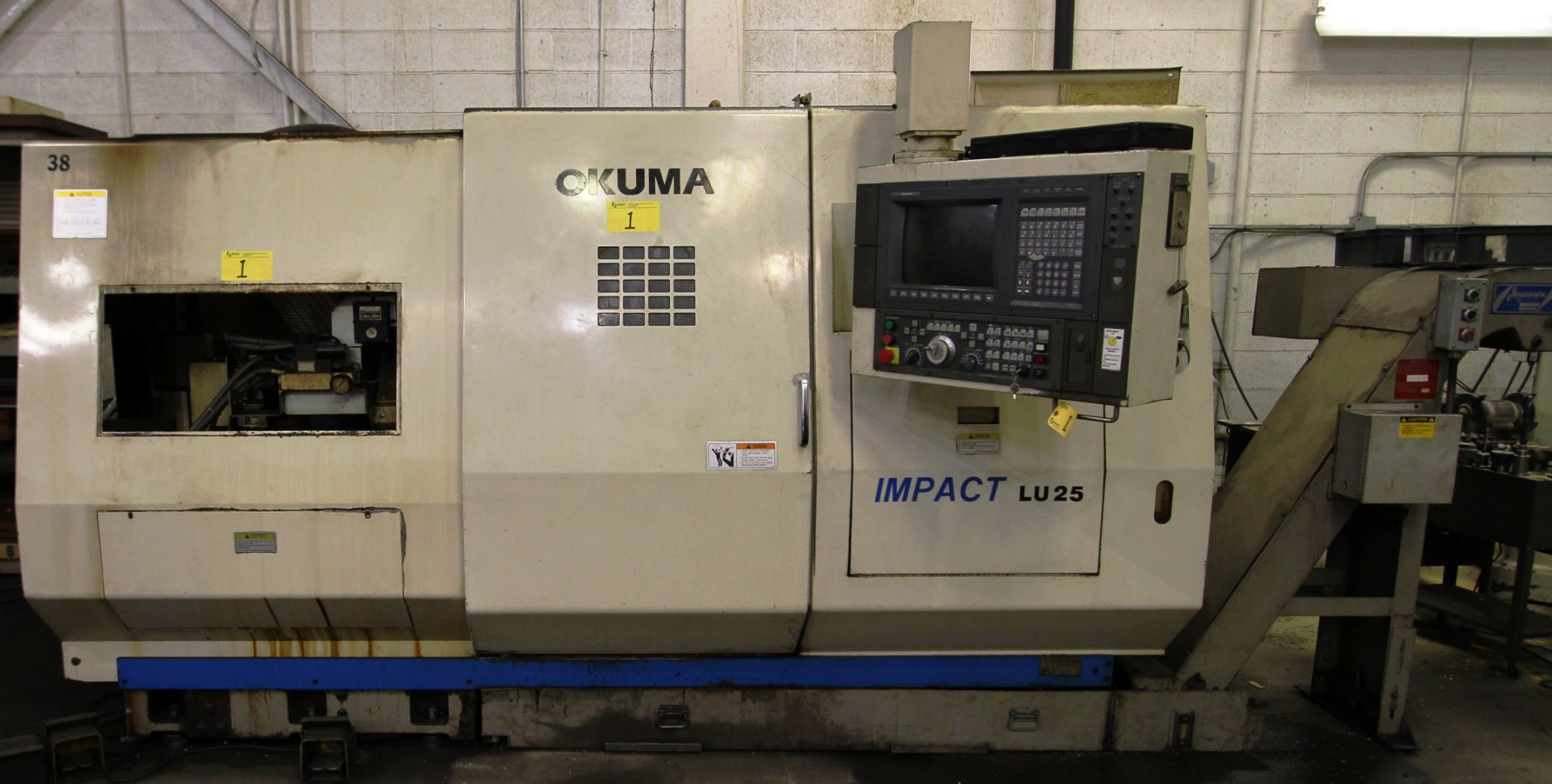 OKUMA Impact LU25 CNC Lathe, Twin (12) Station Turrets, Tailstock, Okuma OSP7000L Control, 12” 3-Jaw