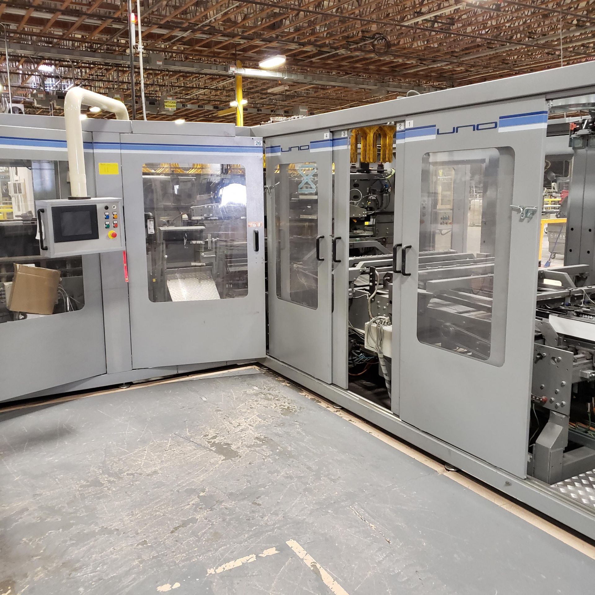 TMC UNO TISSUE WRAPPER, MACHINE #A3687, 4 LANE INFEED. (B2 UNO WRAPPER)