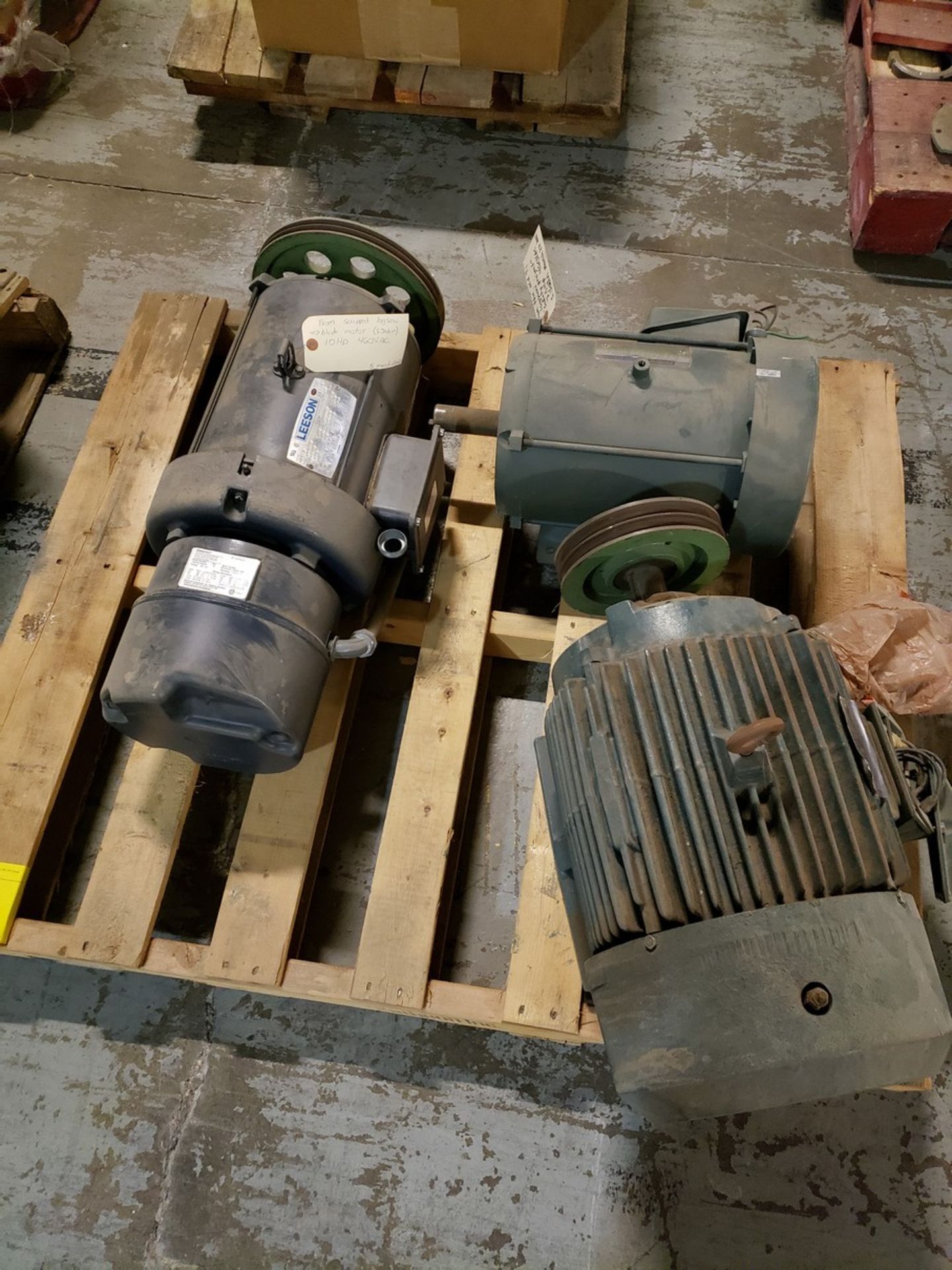 PALLET WITH 3 MOTORS, LEESON 10.75 HP W/ STEARNS BRAKE ATTACHED, RELIANCE ELECTRIC MOTOR 7.5 HP, AND