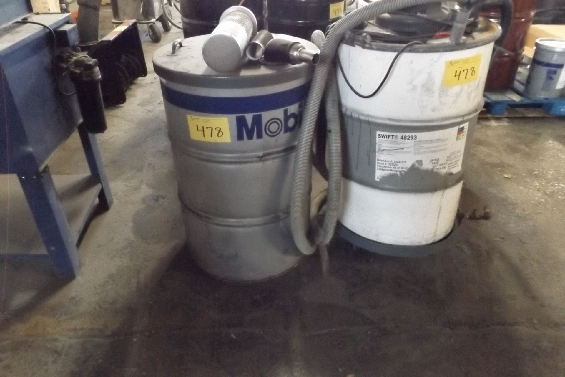 LOT OF 2 ,  55 GAL BARREL TOP SHOP VACUUMS, CW/ BARRELS  (MAINT SHOP)