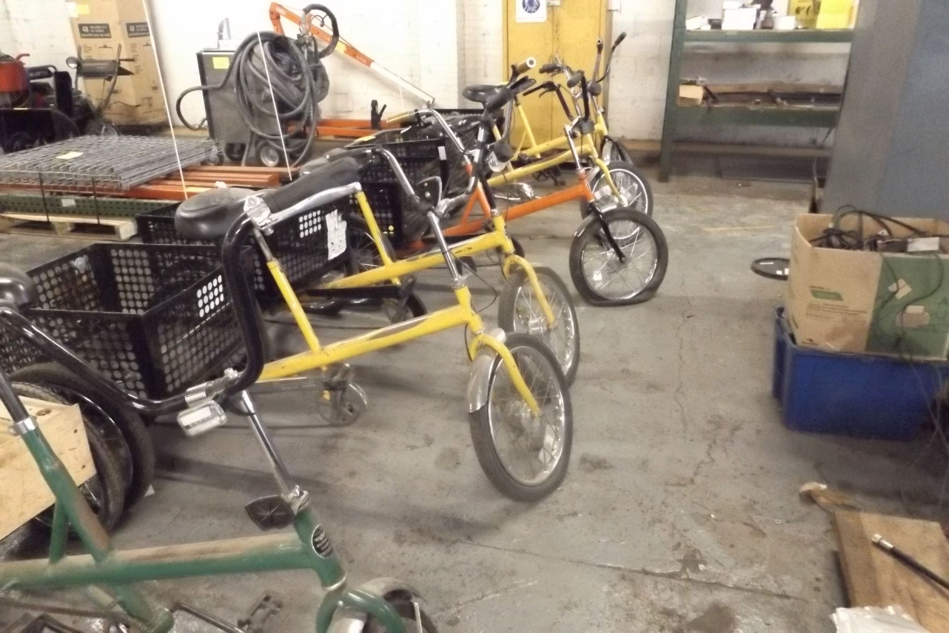 LOT OF 6 WORKMAN TRICYCLES ( NEED SOME REPAIRS)  (MAINT SHOP)