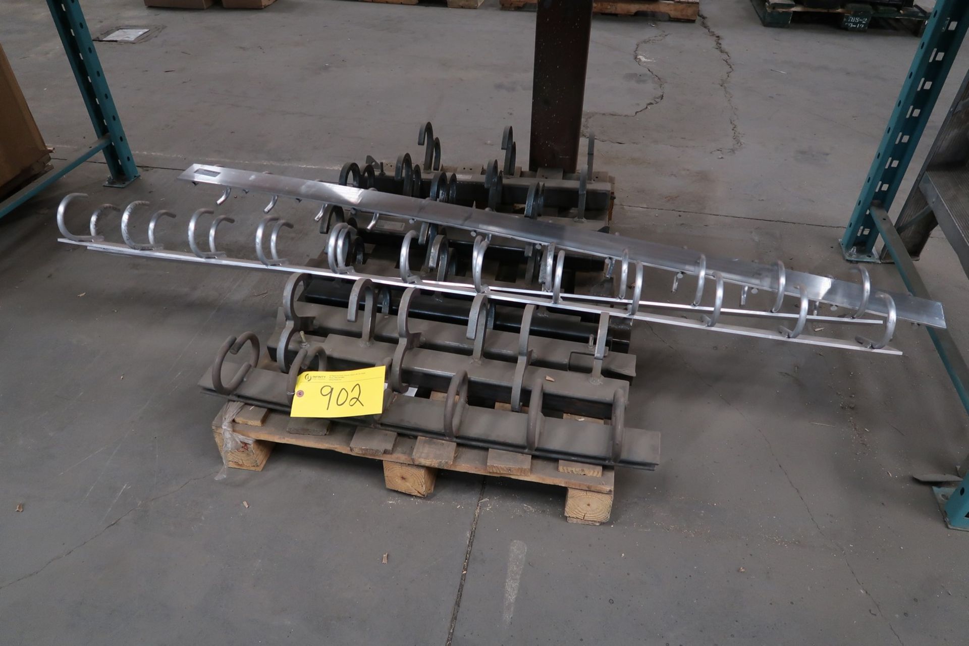 PALLET OF TRUCK DECK HANGERS FOR CHAIN