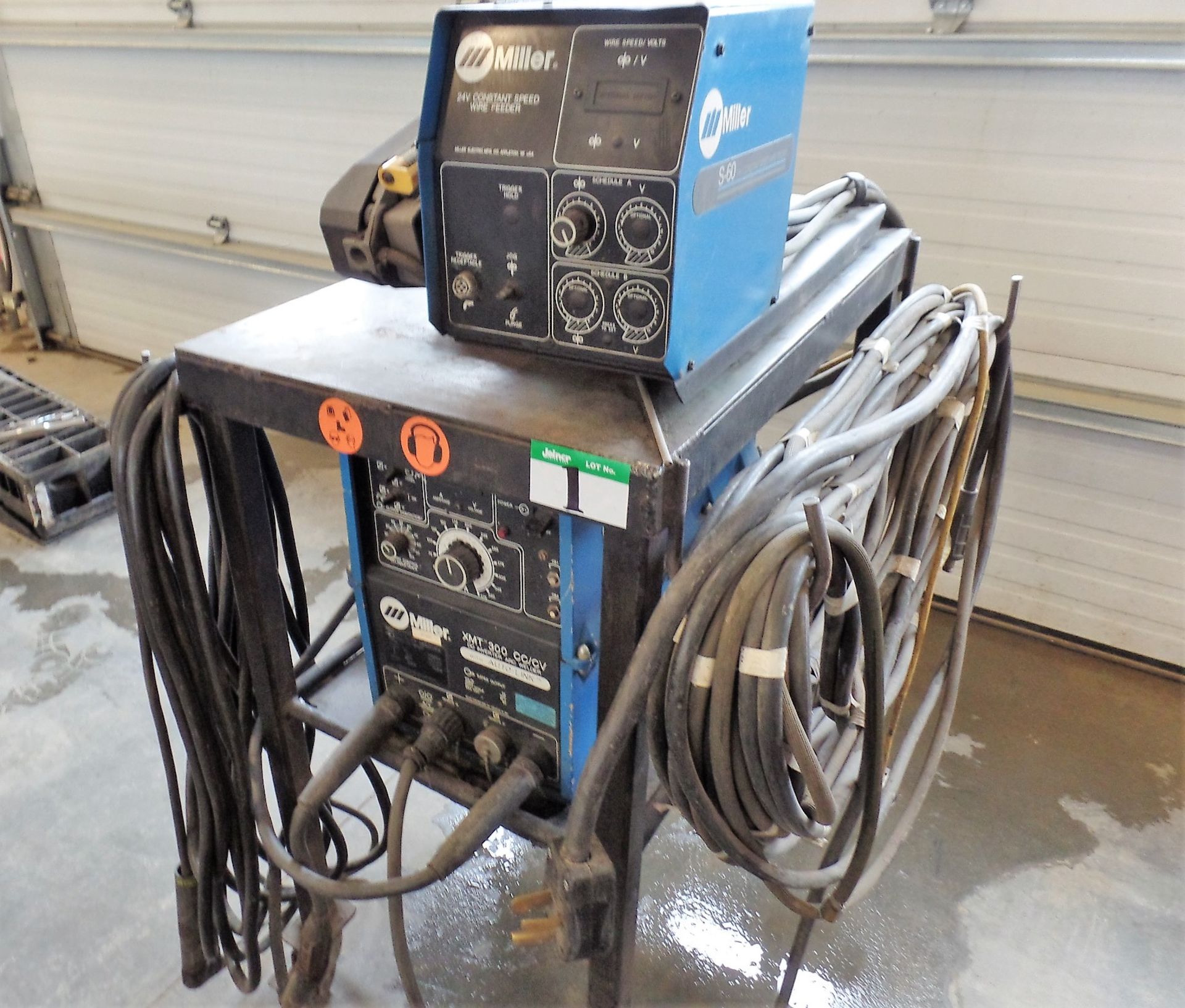 MILLER XMT 300 CC/CV WELDER W/MILLER S-60 WIRE FEEDER C/W MOBILE CART