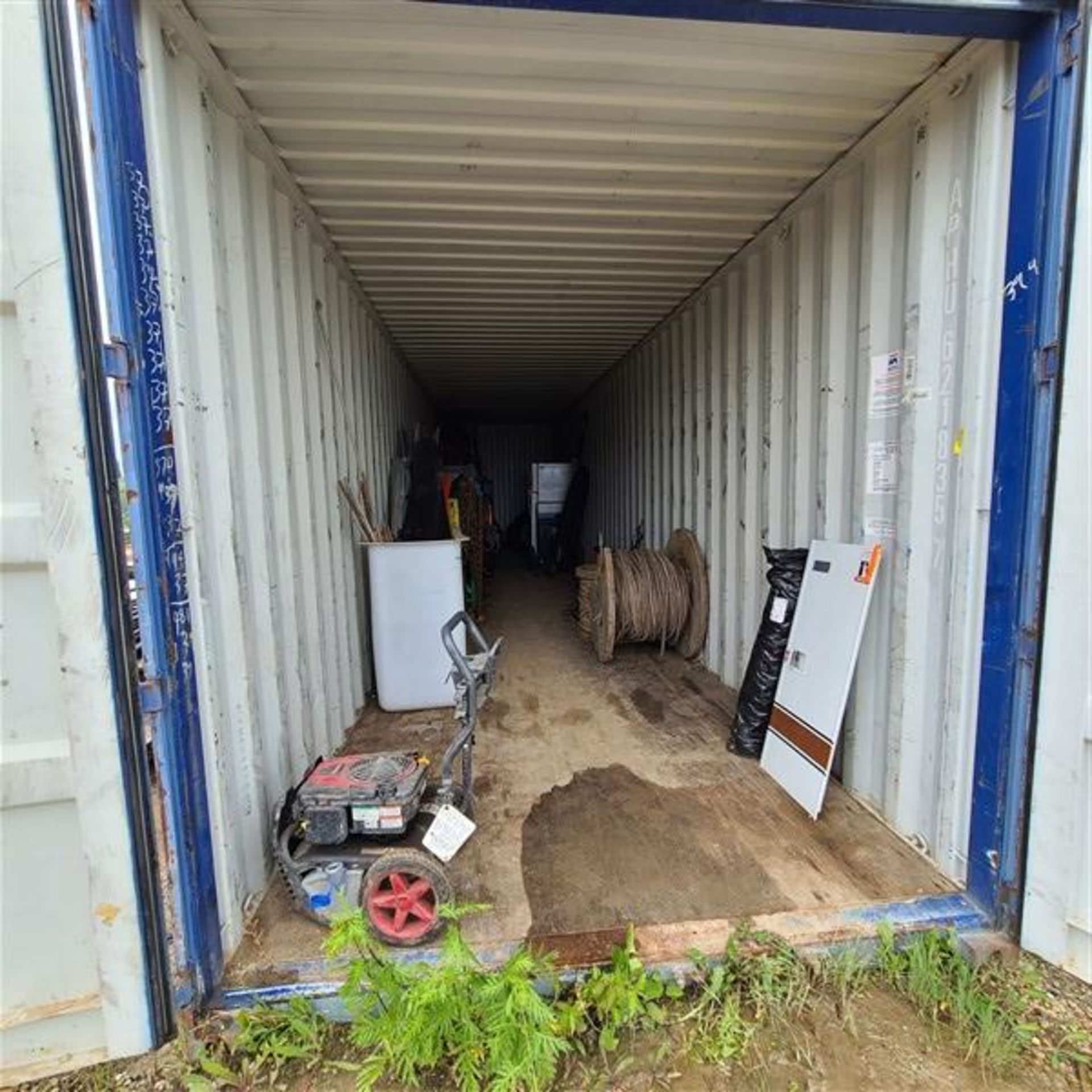 CONTENTS OF BLUE SEACAN CONTAINER, REEL OF ROPE, TIRES, SLINGS ETC.