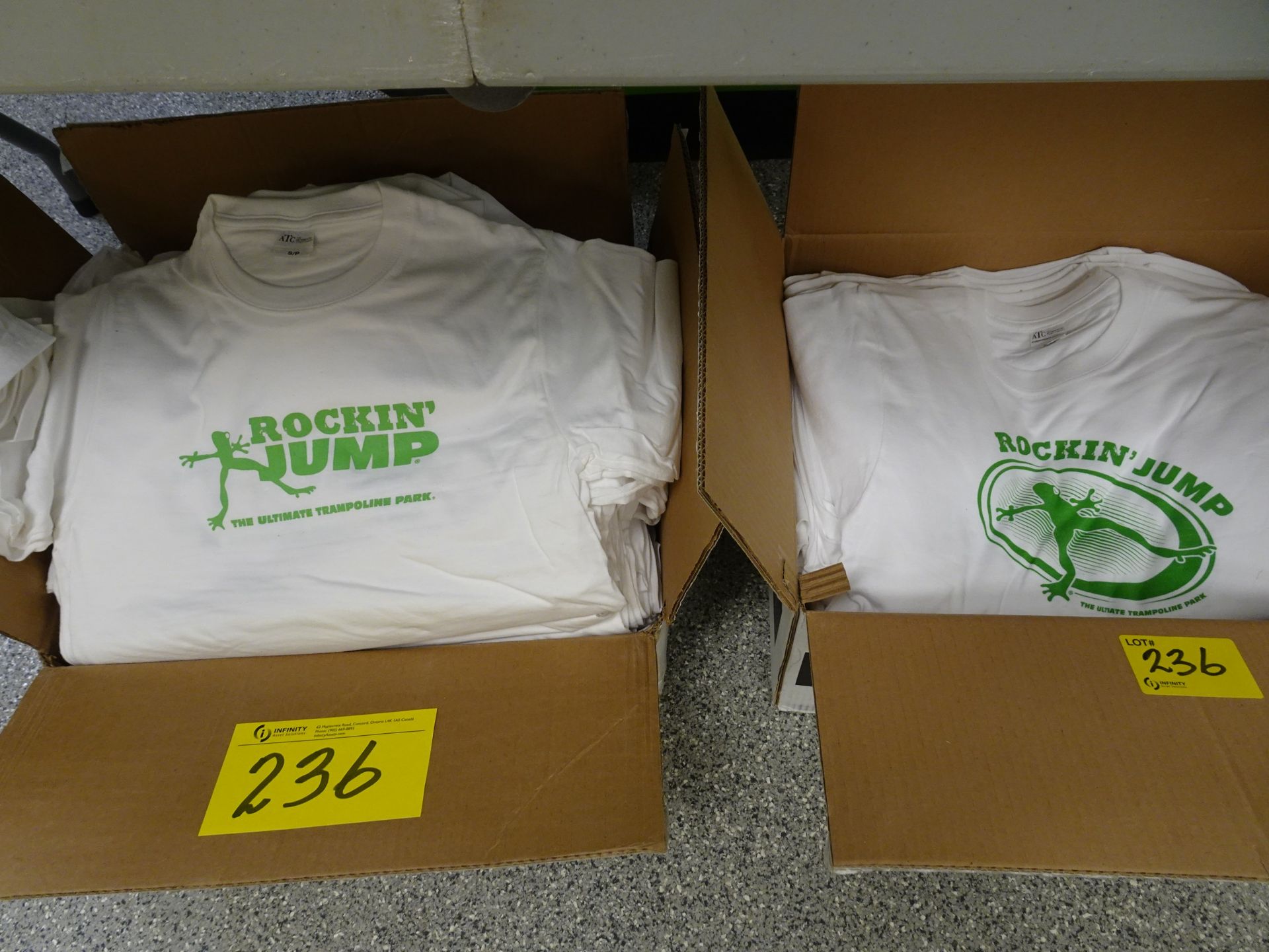 Lot of assorted sizes Rockin' Jump t-shirts (approx 150) w/ folding table - Image 2 of 4