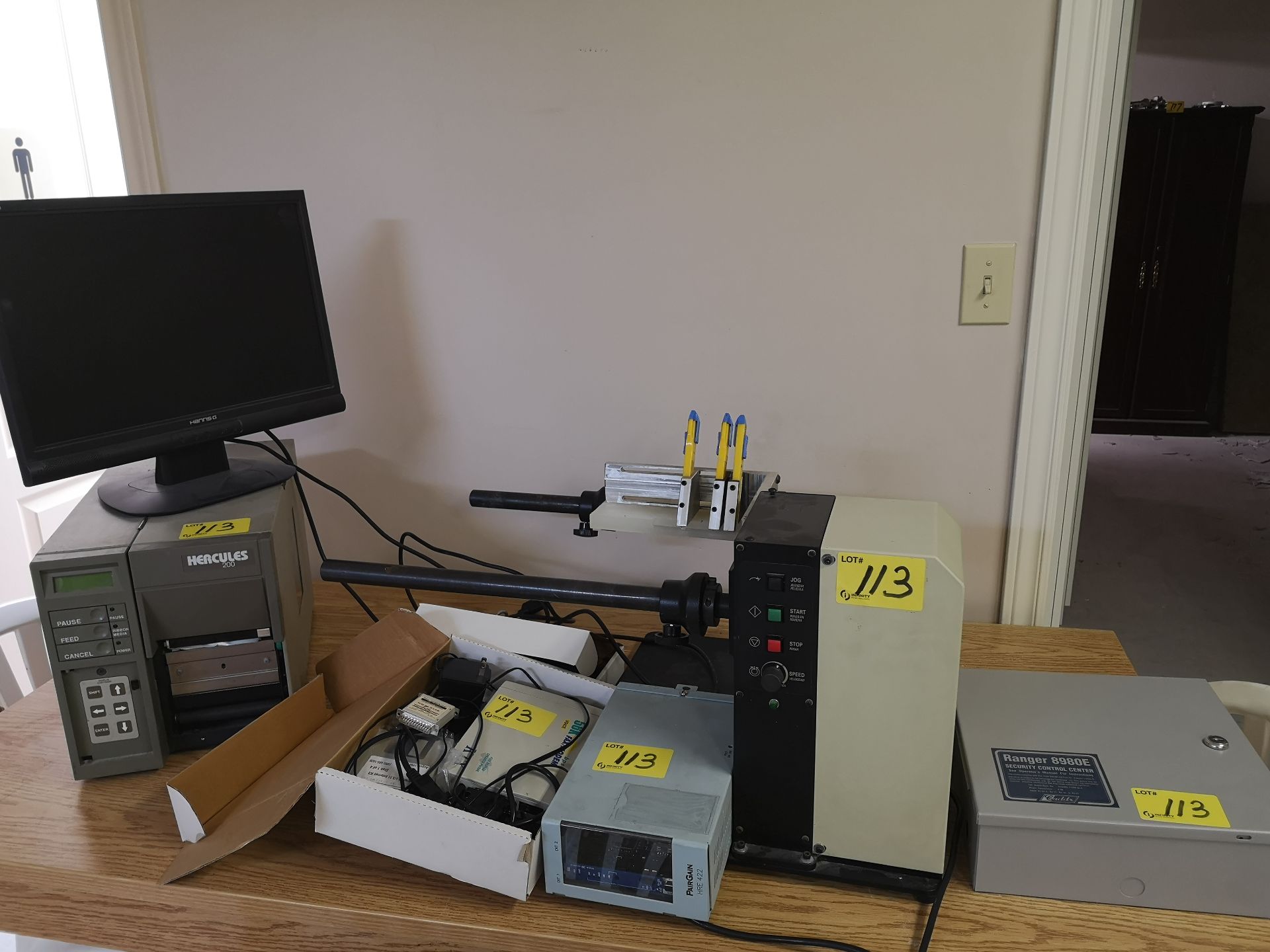 HERCULES 200 LABEL PRINTER W/ FEEDER, MONITOR, ETC.