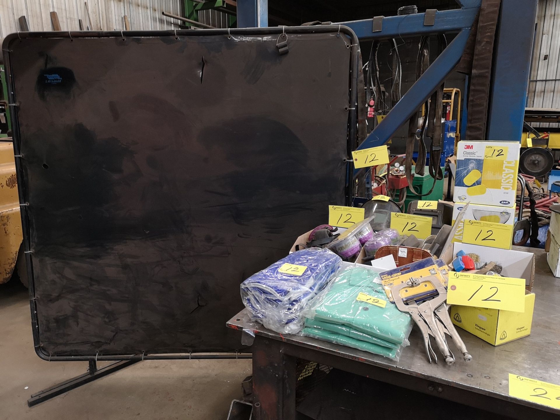 LOT OF ASSORTED WELDING SUPPLIES: WELDING SCREENS, SHIELDS, MASKS, EAR PLUGS, GLOVES, COATS,