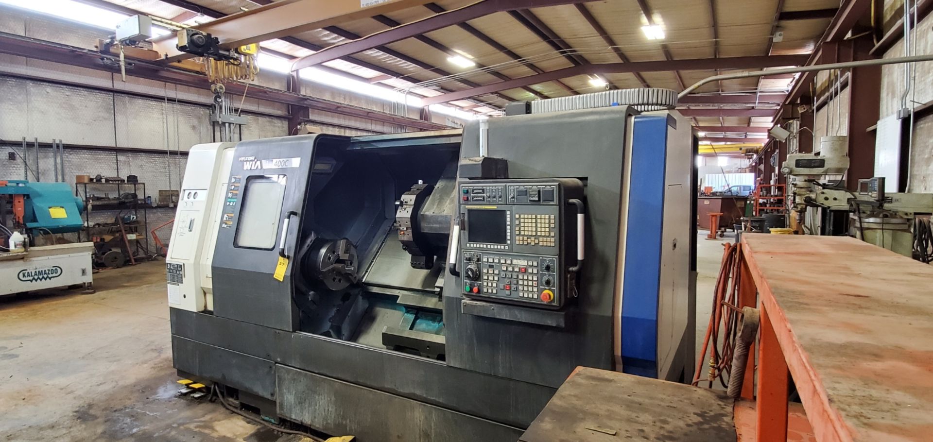 2012 HYUNDAI WIA L400C CNC TURNING CENTER, WITH 15" 3 JAW CHUCK, 10 POSITION TURRET