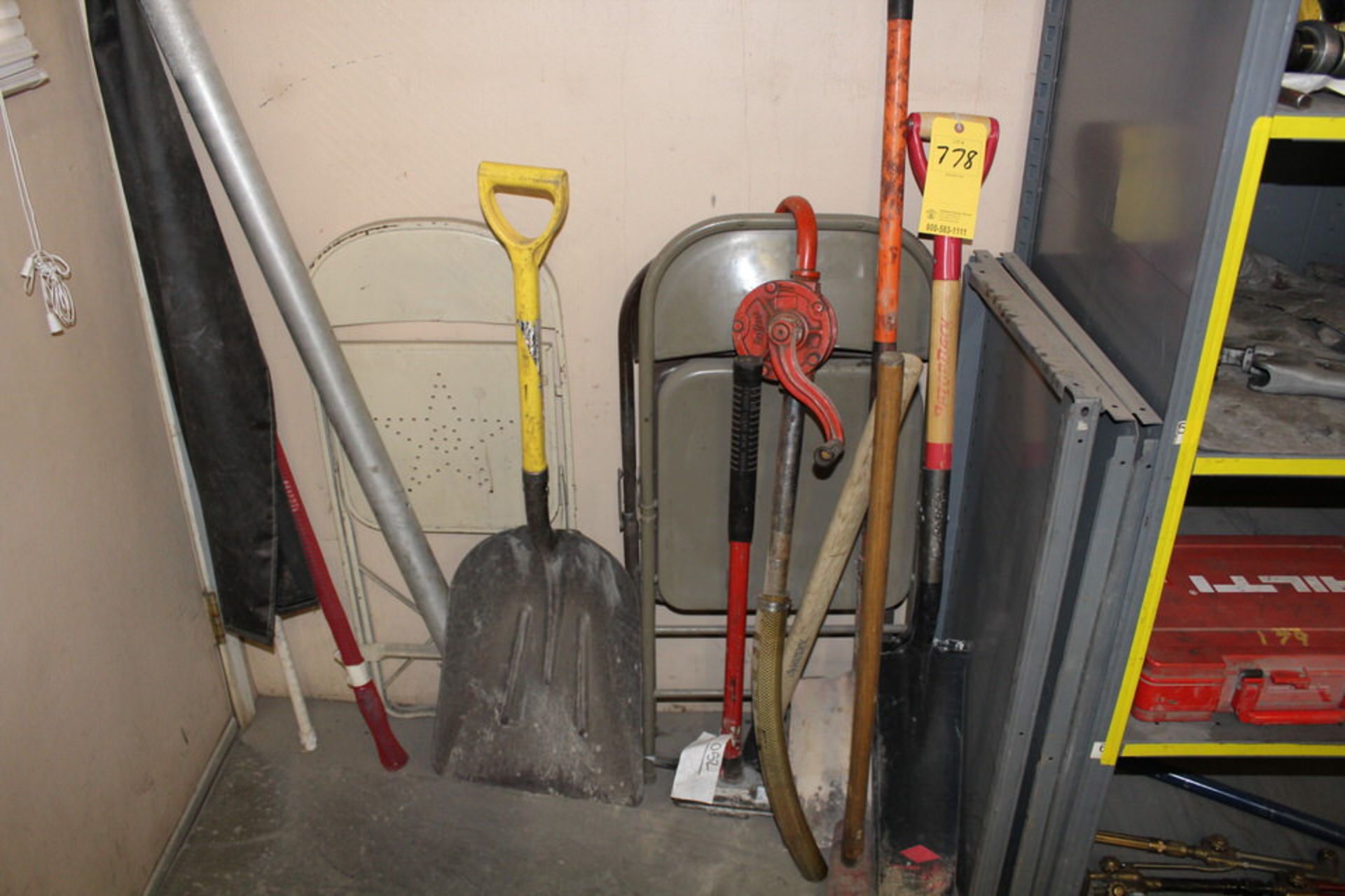 CONT OF WALL: SLEDGE HAMMER, BARREL PUMP, SHOVEL, FOLDING CHAIRS