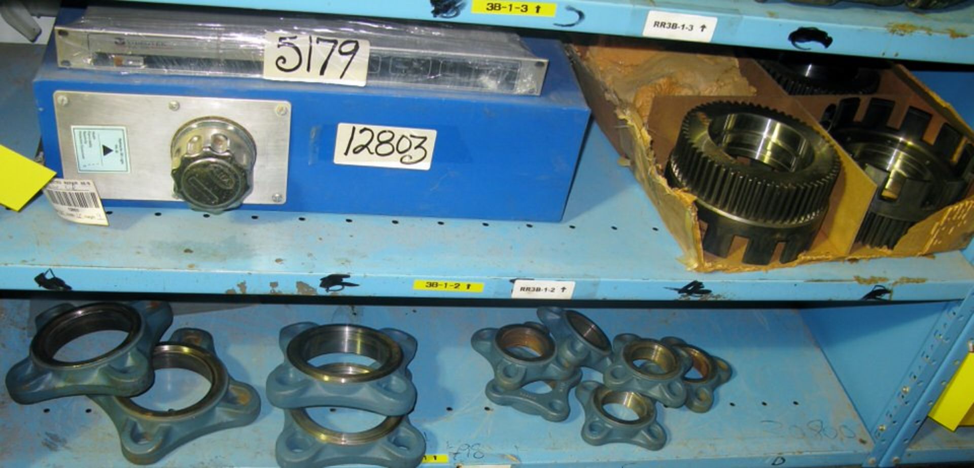 Hydraulic tank, gears, bearing boss, plus misc shelf contents