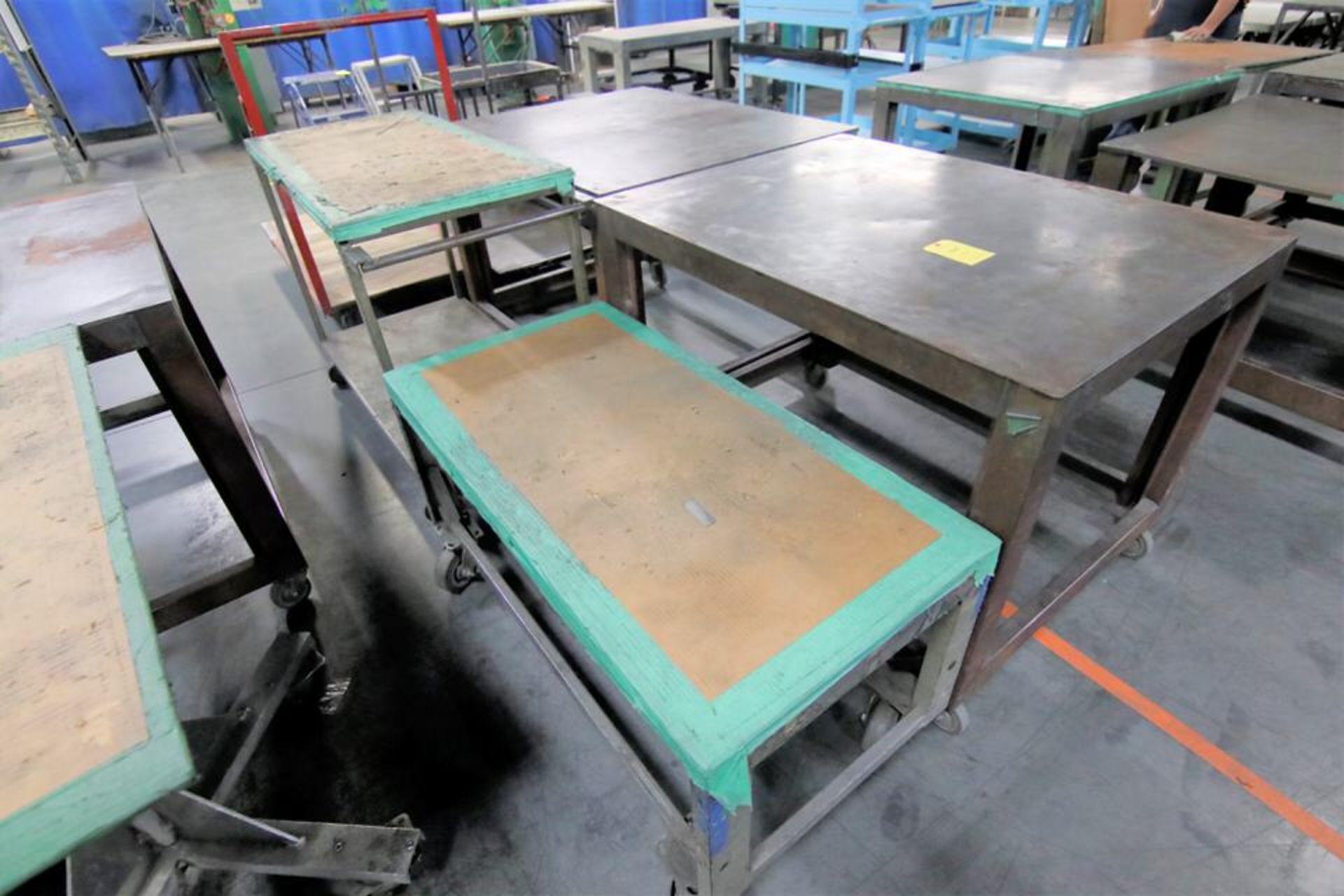 Lot of 4: Asst. size shop tables on casters