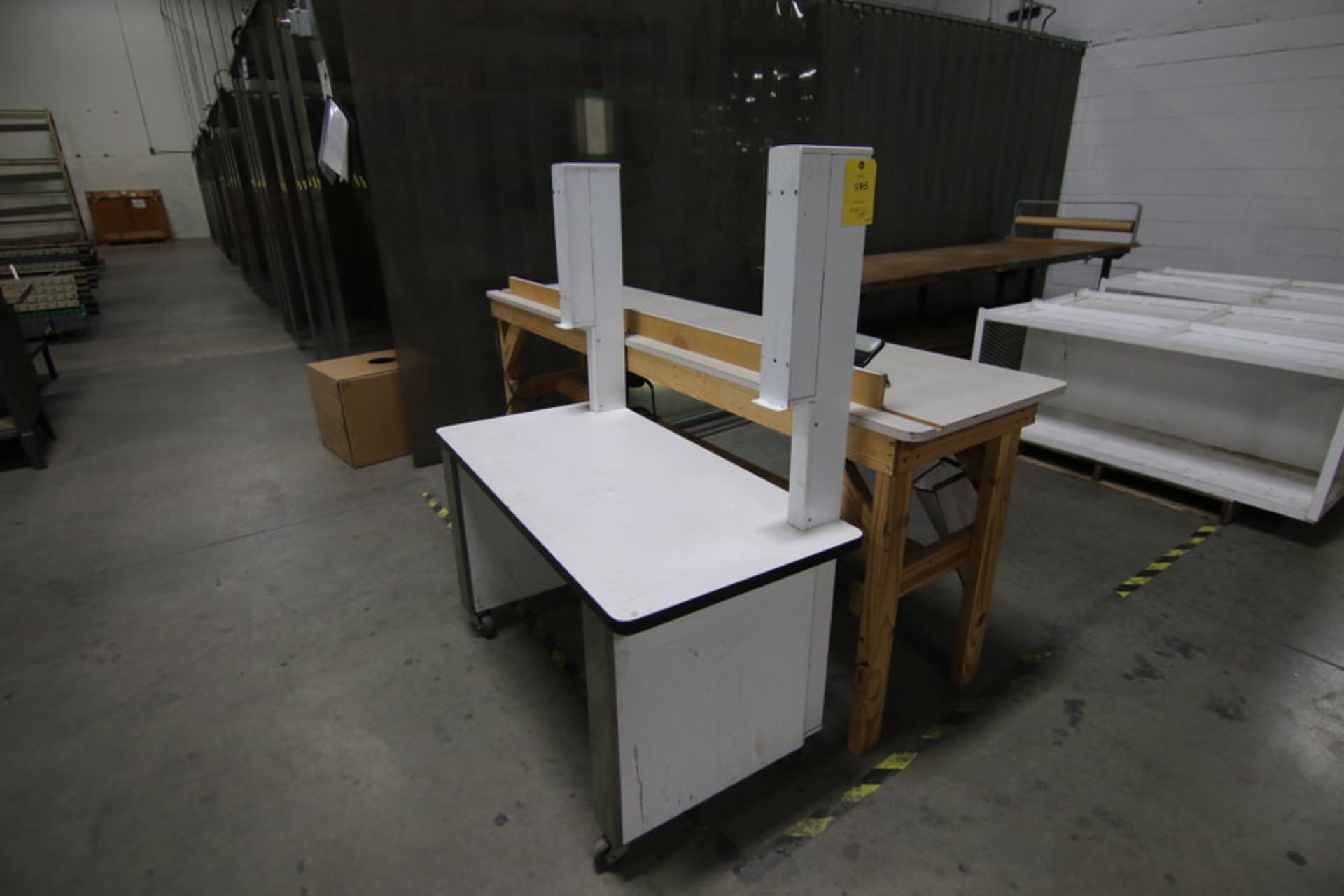 Shipping Station: (1) Work Stations with Paper Dispenser, (1) Station with backstop and electric ho