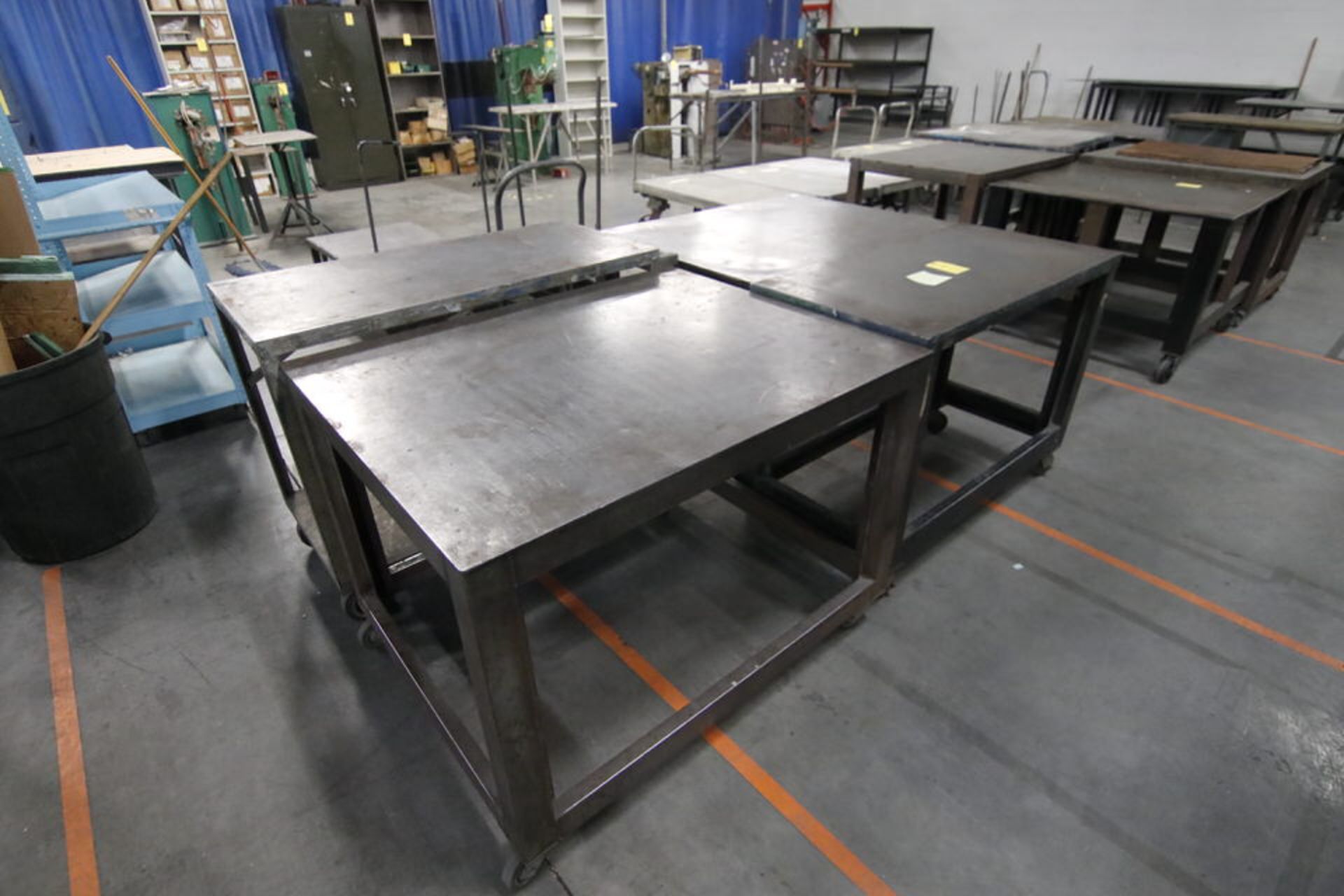 Lot of 4: Asst. size shop tables on casters