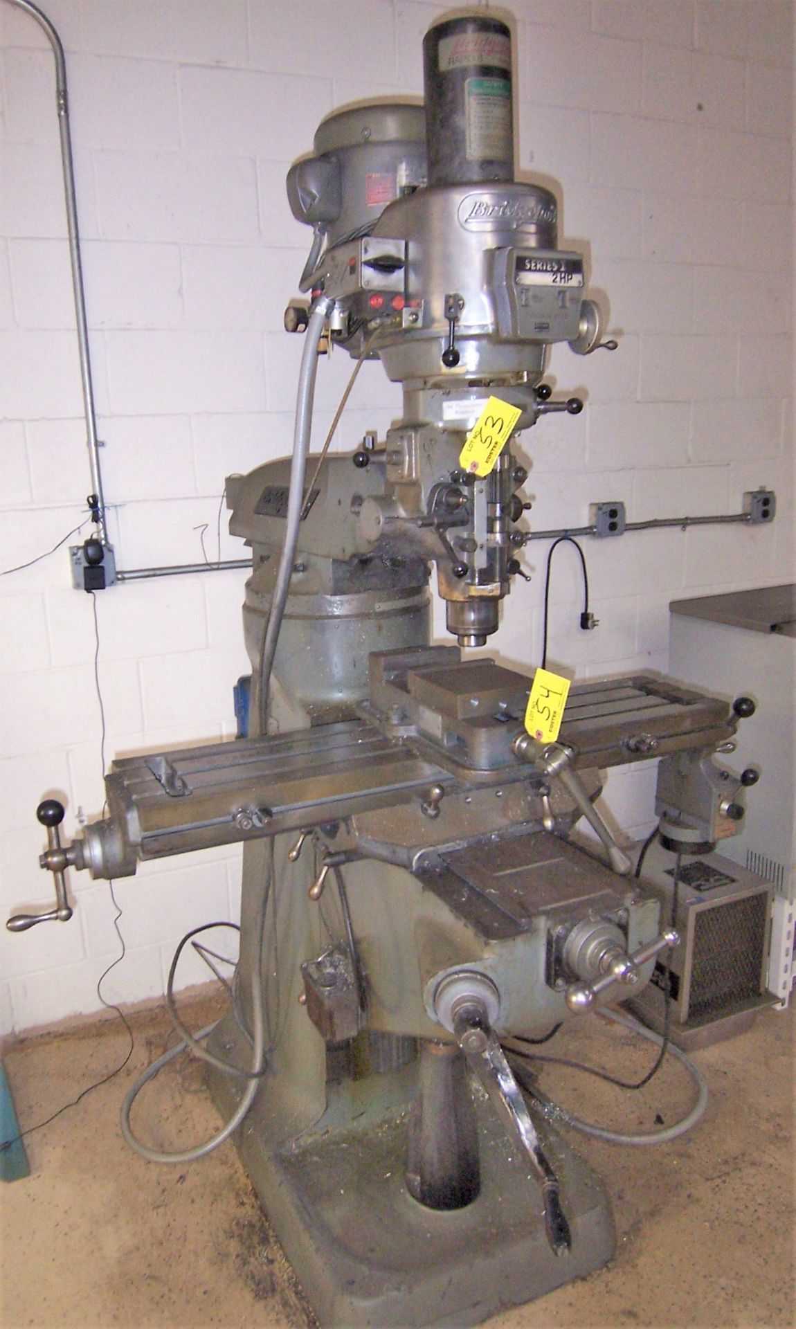 BRIDGEPORT SERIES I 2HP VERTICAL MILLING MACHINE WITH A 9" X 42" POWER FEED TABLE, SPINDLE SPEEDS TO