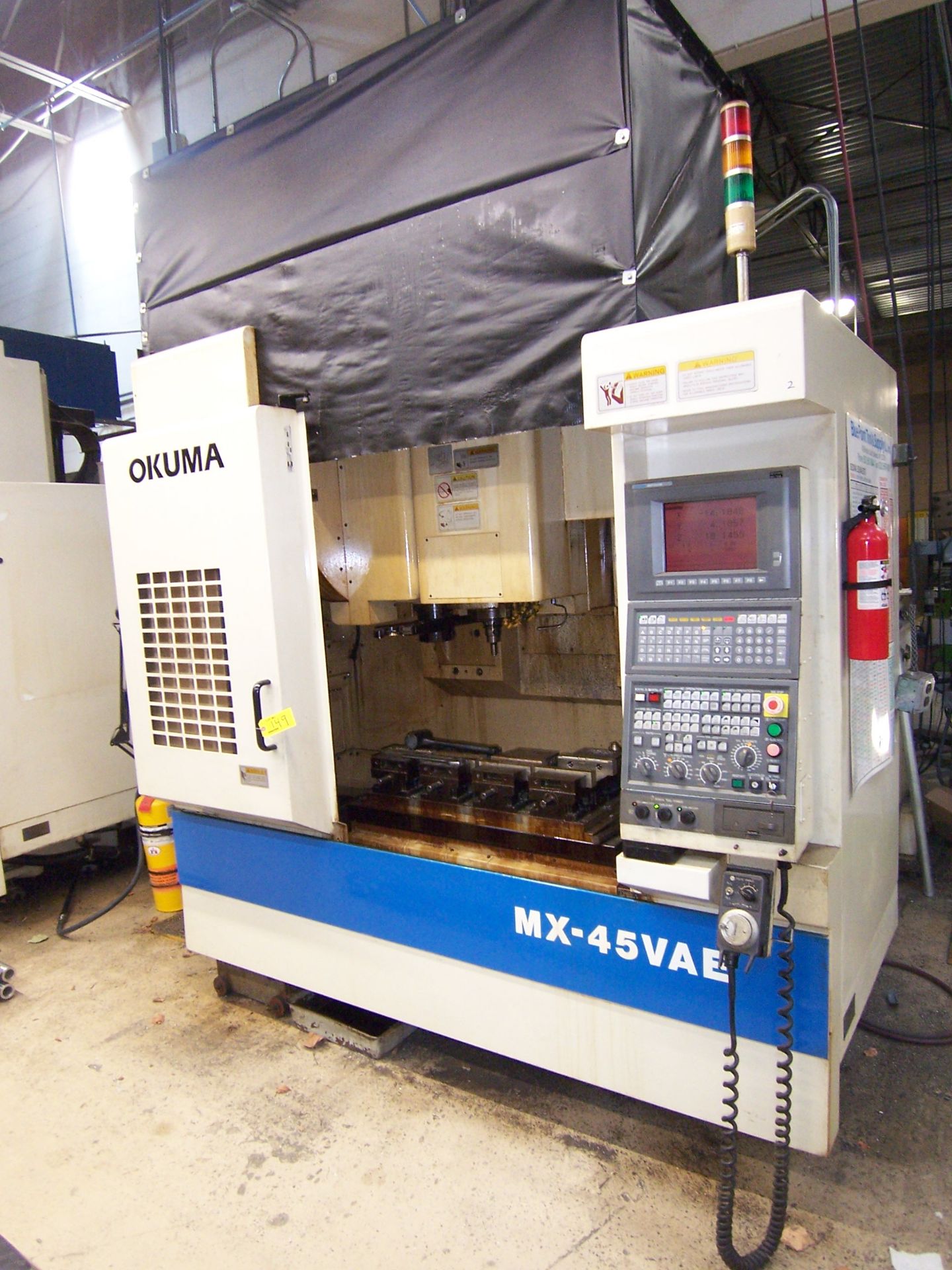 OKUMA MDL. MX-45VAE VERTICAL MACHINING CENTER WITH 18.11" X 39-1/2" TABLE, TRAVELS: X-30, Y-18.