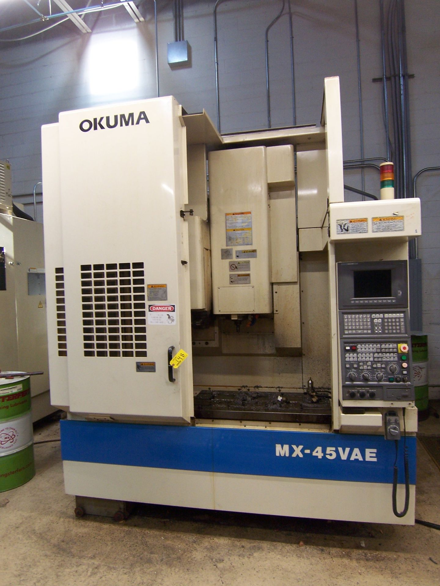 OKUMA MDL. MX-45VAE VERTICAL MACHINING CENTER WITH 18.11" X 39-1/2" TABLE, TRAVELS: X-30, Y-18.11"