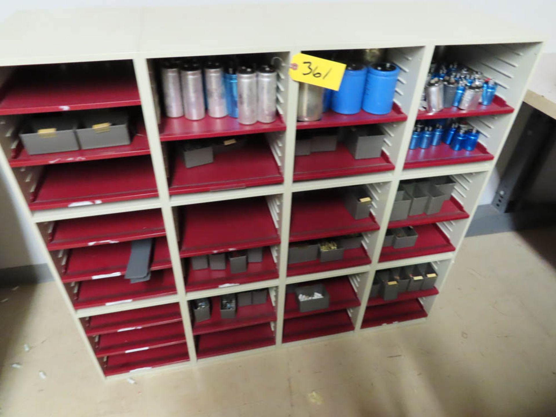 SHELF WITH HIGH VOLTAGE CAPACITORS